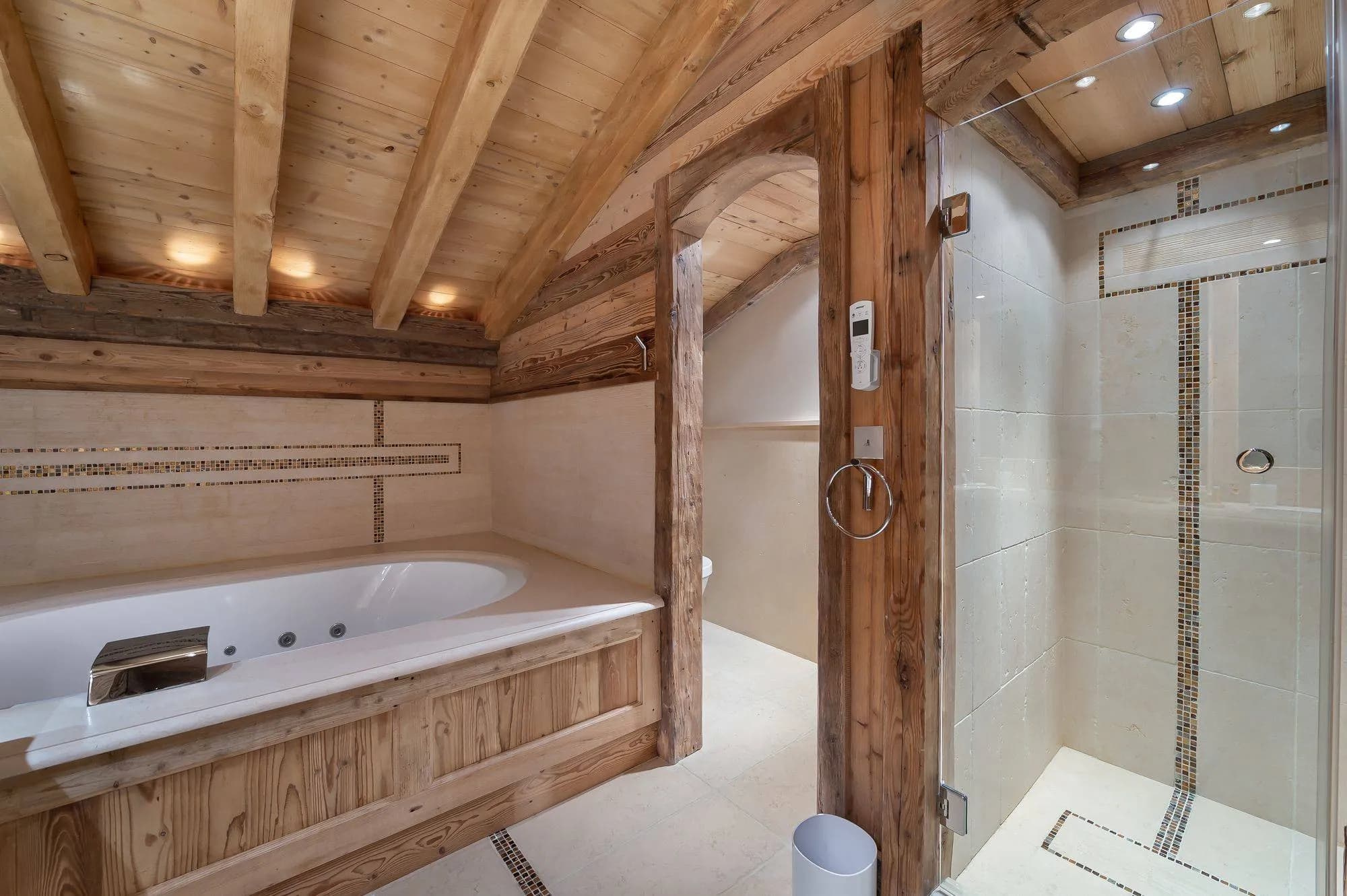 Bathroom with a whirlpool bath and separate shower