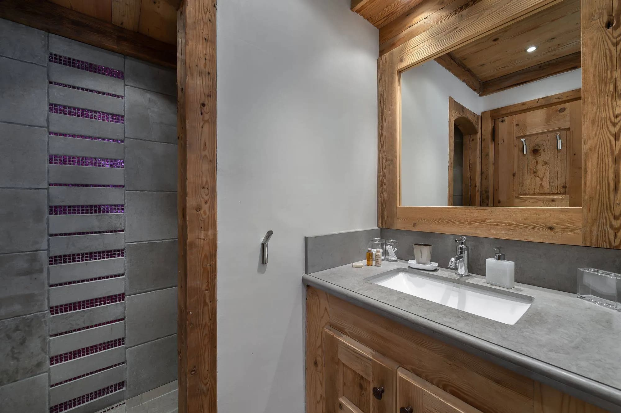 Bathroom vanity with a large mirror