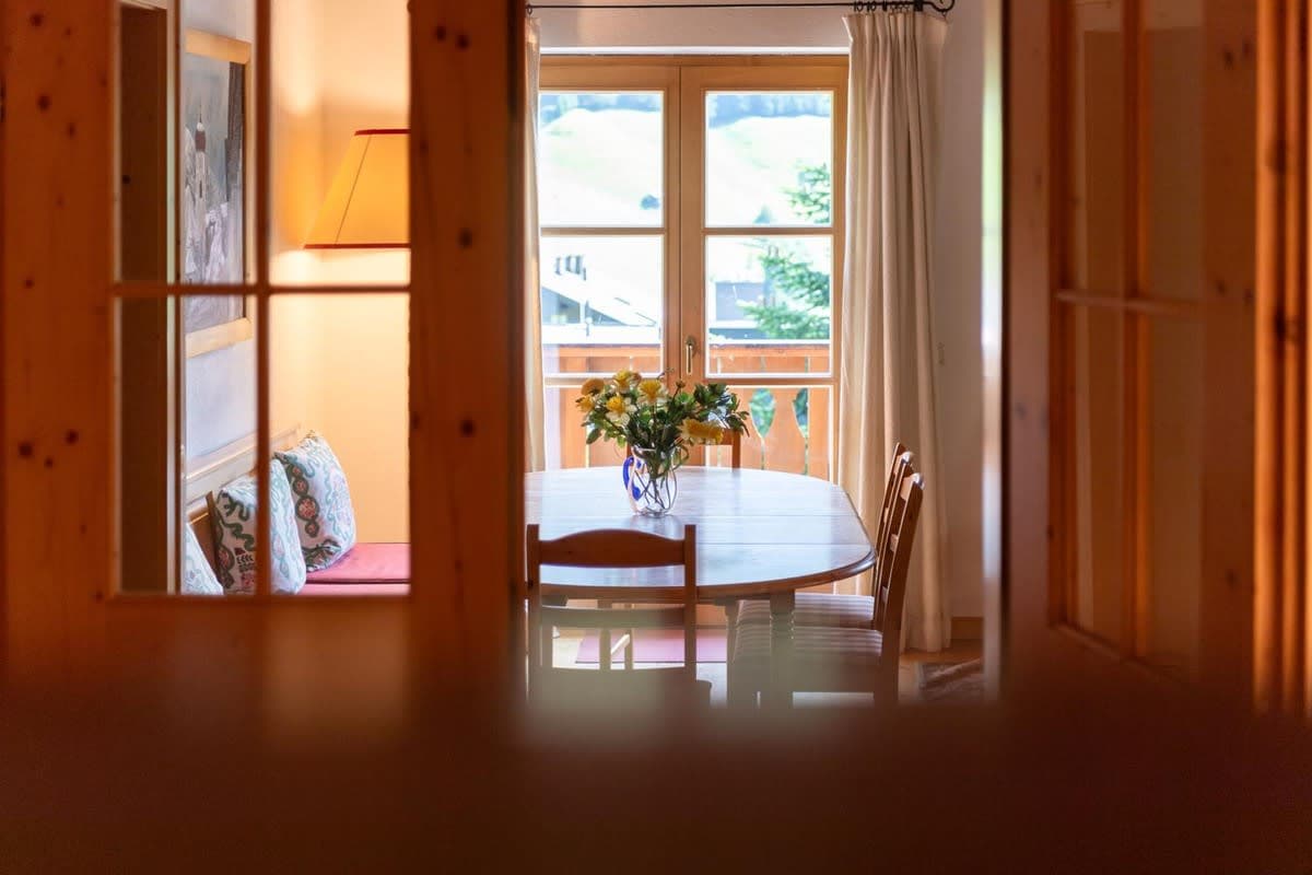 Dining area with balcony access and banquet seating