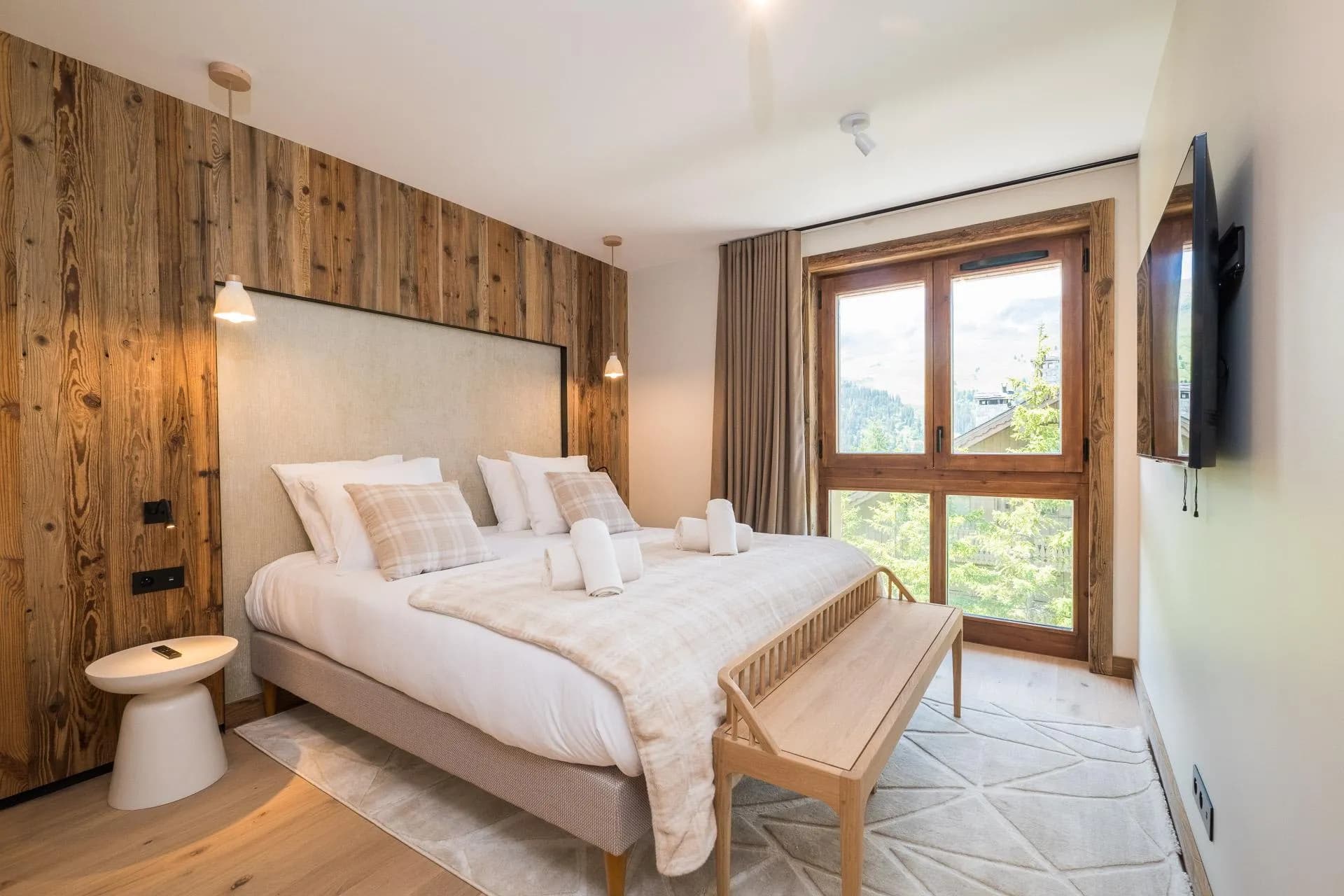 Double bedroom with mountain-view window