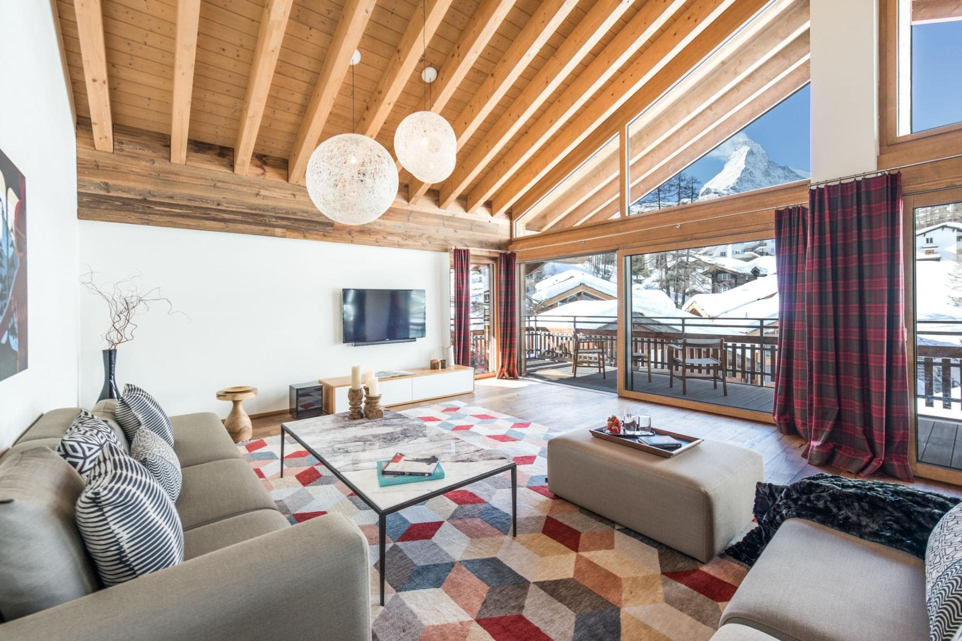 Living area with Matterhorn views and vaulted timber ceilings