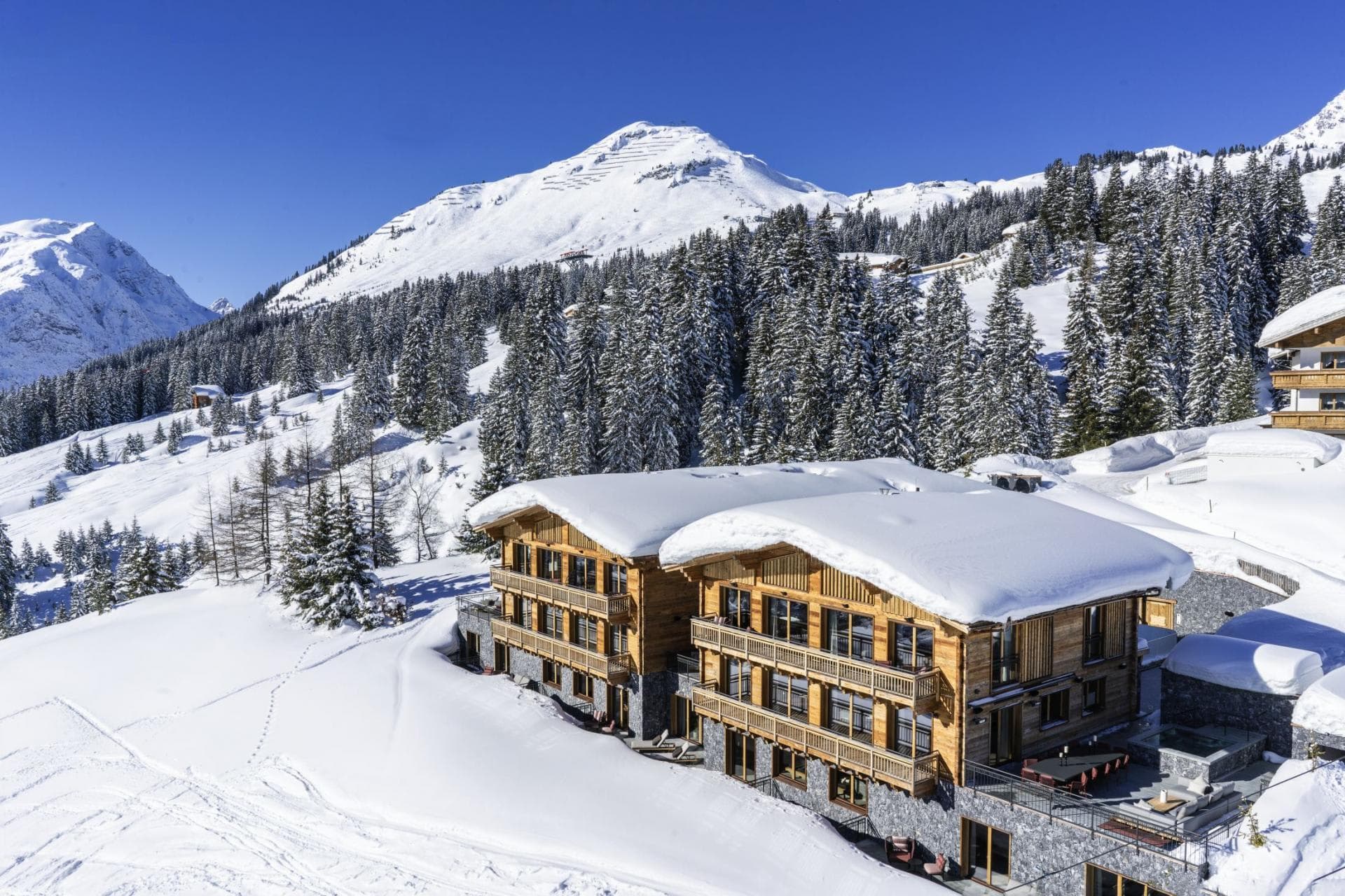 Ski-in/ski-out chalet with mountain views and wrap-around balconies