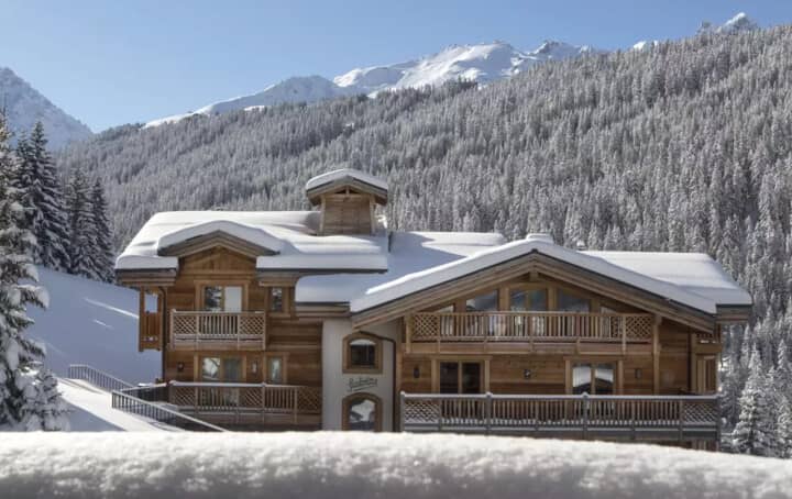 Ski-in ski-out chalet with multiple private balconies and mountain views
