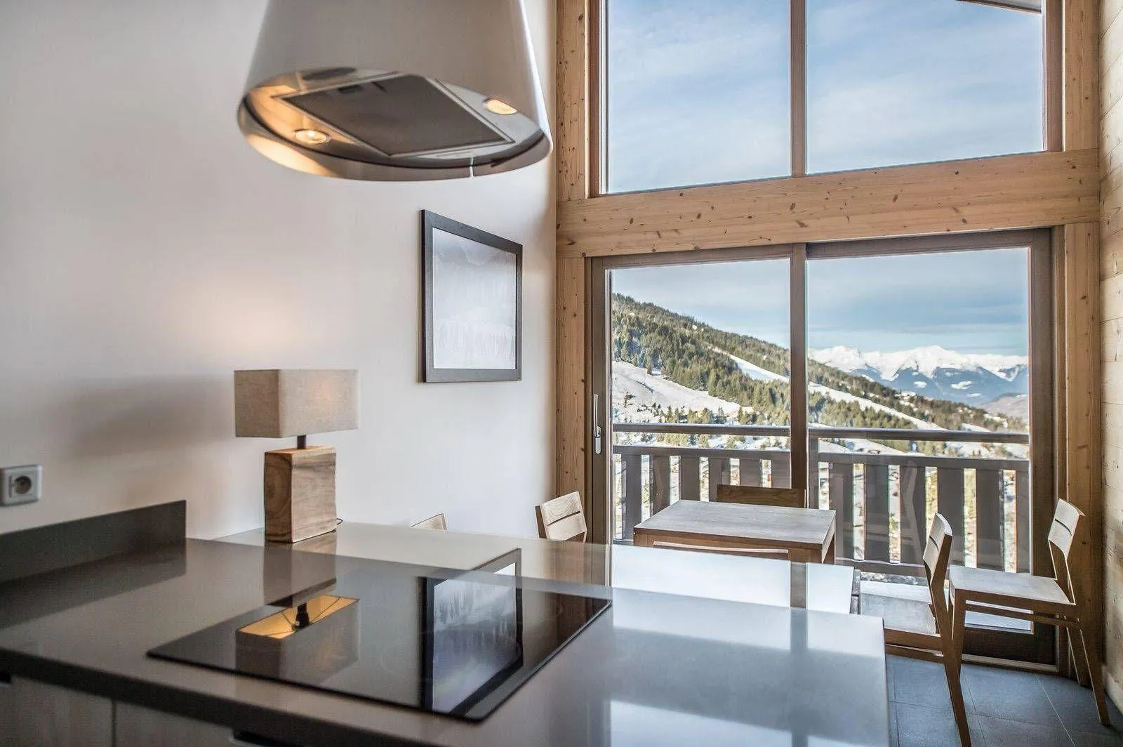Breakfast area beside picture windows overlooking the valley