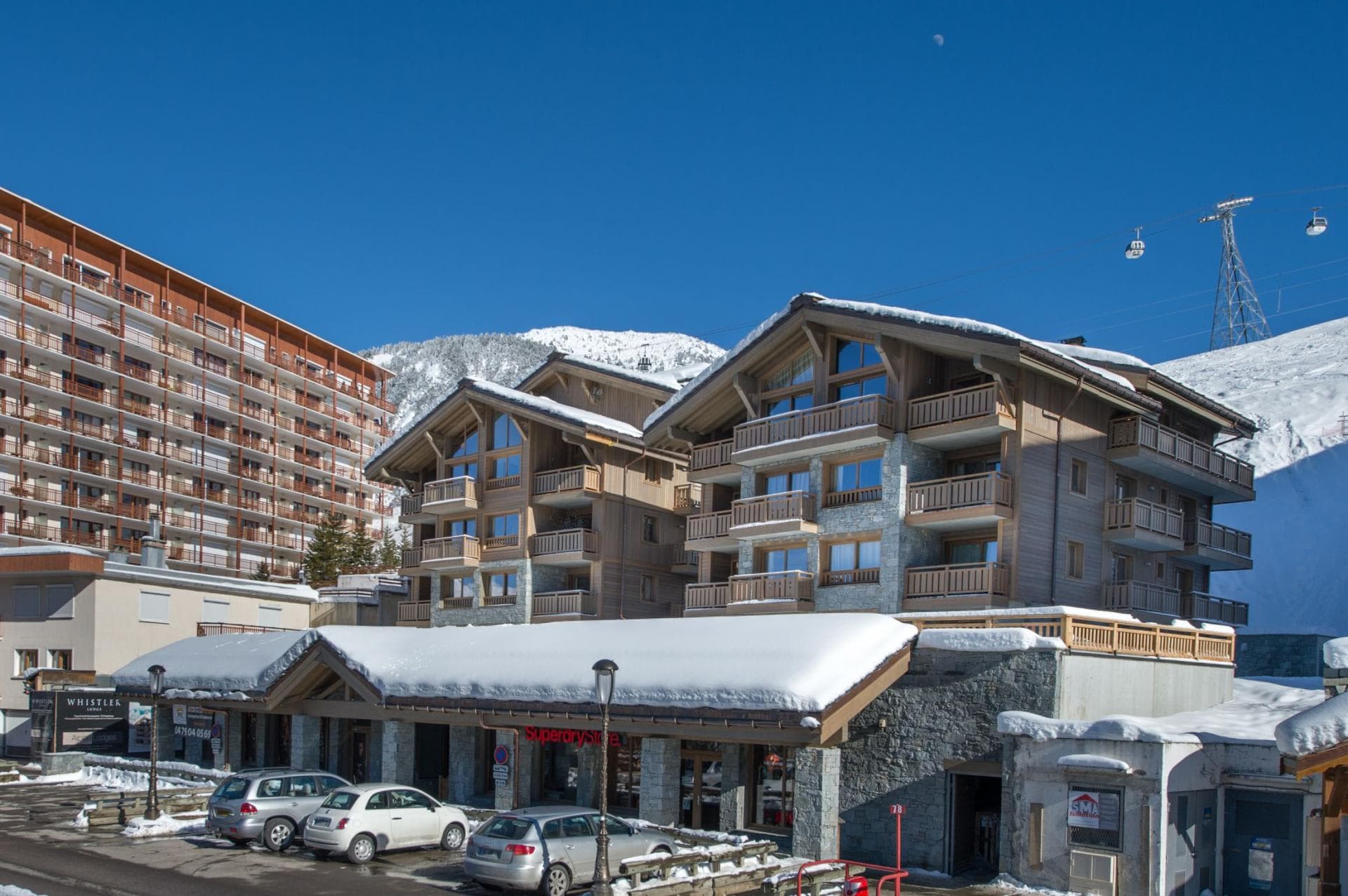 Ski-in lodge exterior; steps from main gondola and mountain base