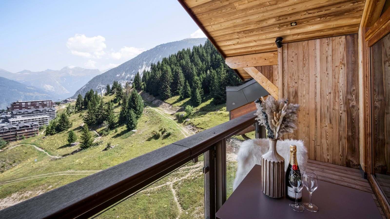 Private covered balcony with mountain valley and ski lift views