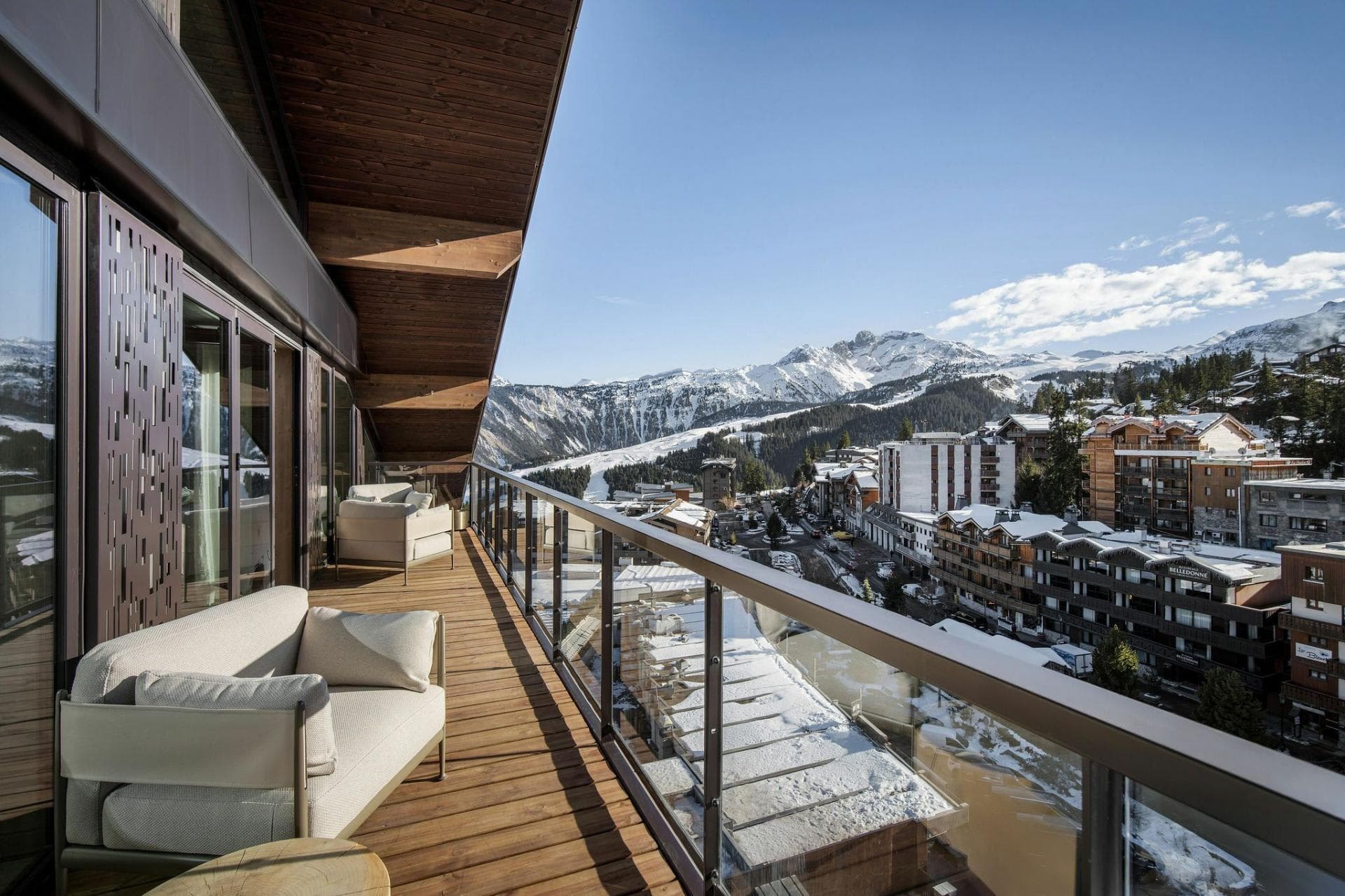 Private balcony with outdoor seating and views of the ski slopes