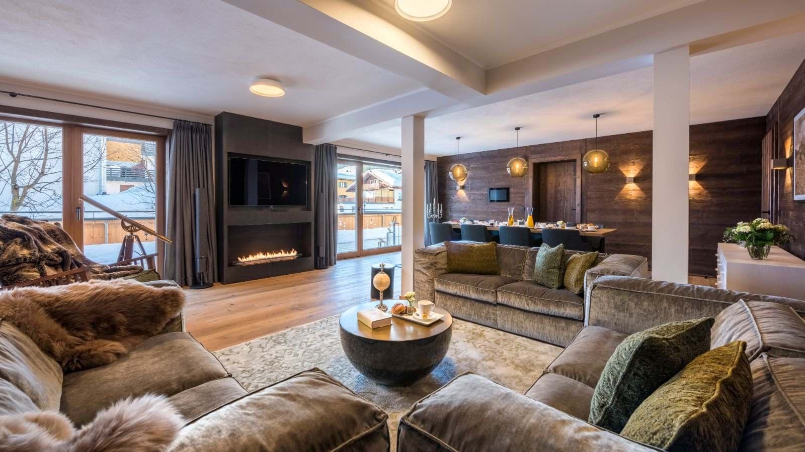 Living area with gas fireplace and dining seating for 10