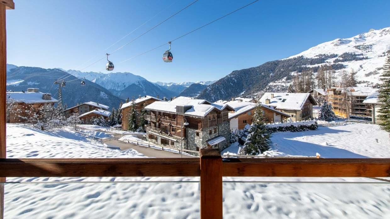 Private balcony view of Medran gondola and surrounding Alps