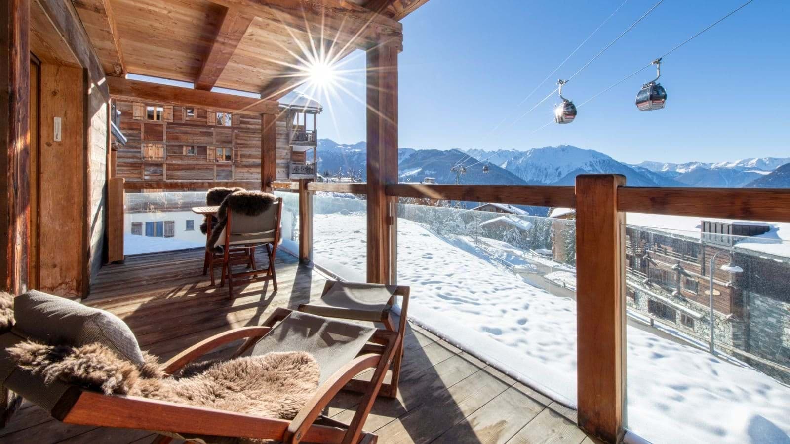 Private balcony with mountain views and direct sight of the gondola
