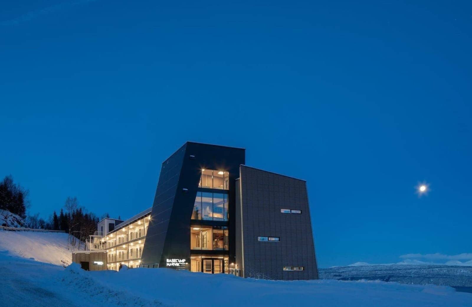 Basecamp Narvik exterior with ski-in access and mountain views
