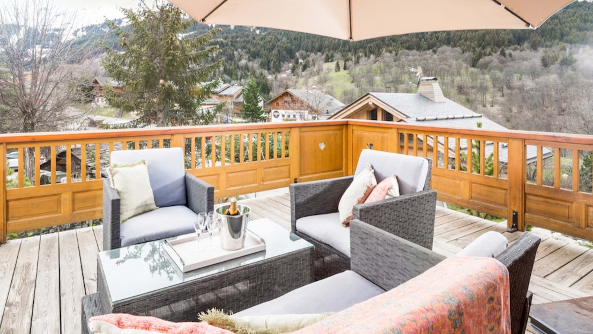 Private balcony with lounge seating for 4 and alpine valley views