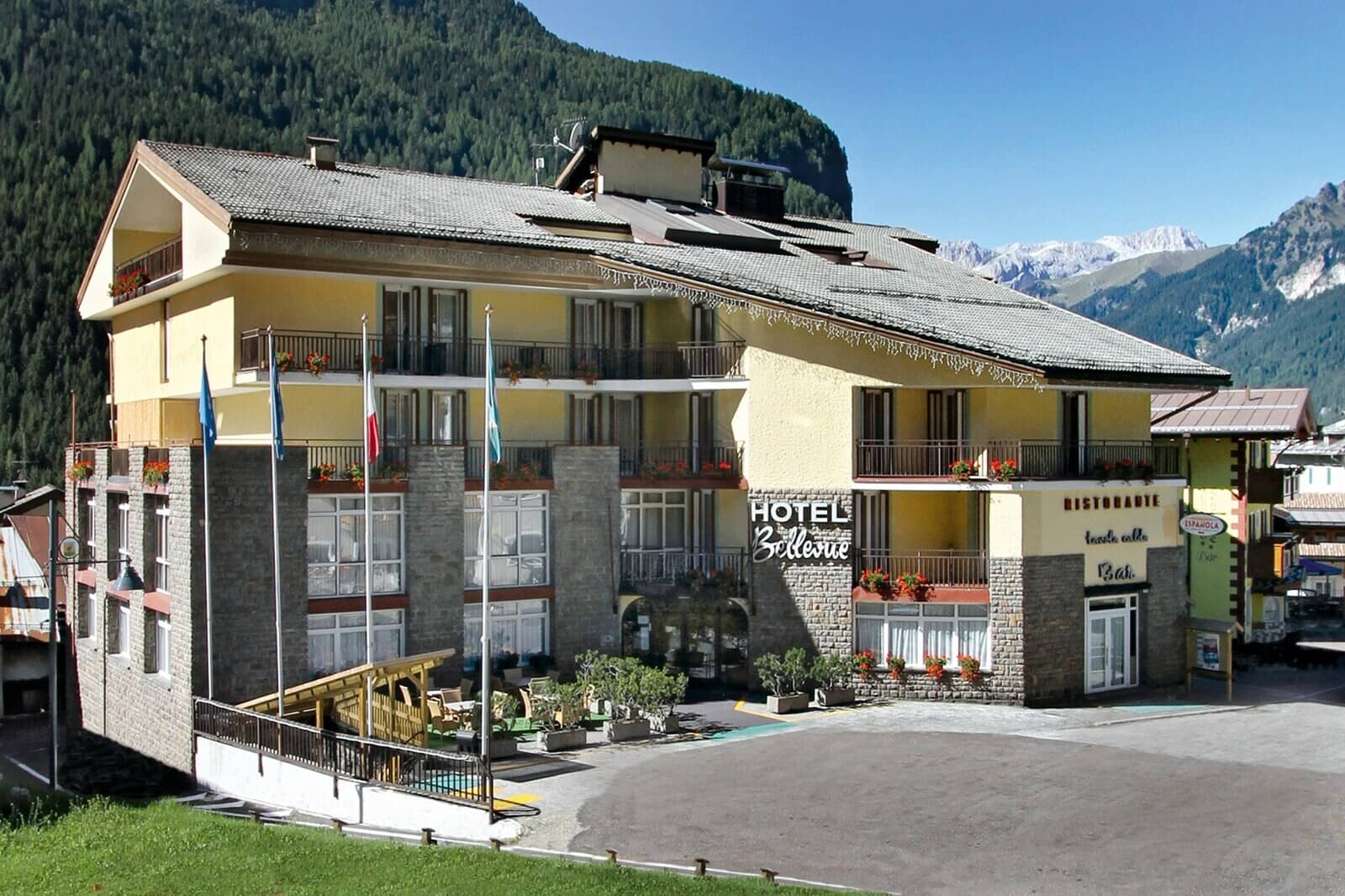 Hotel exterior with private balconies and on-site restaurant