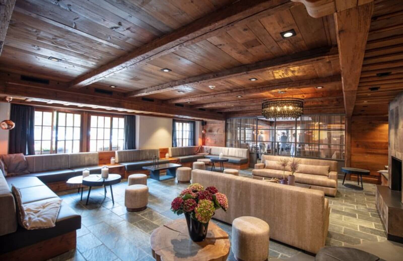 Lounge area with reclaimed wood ceilings and seating for over 20 guests