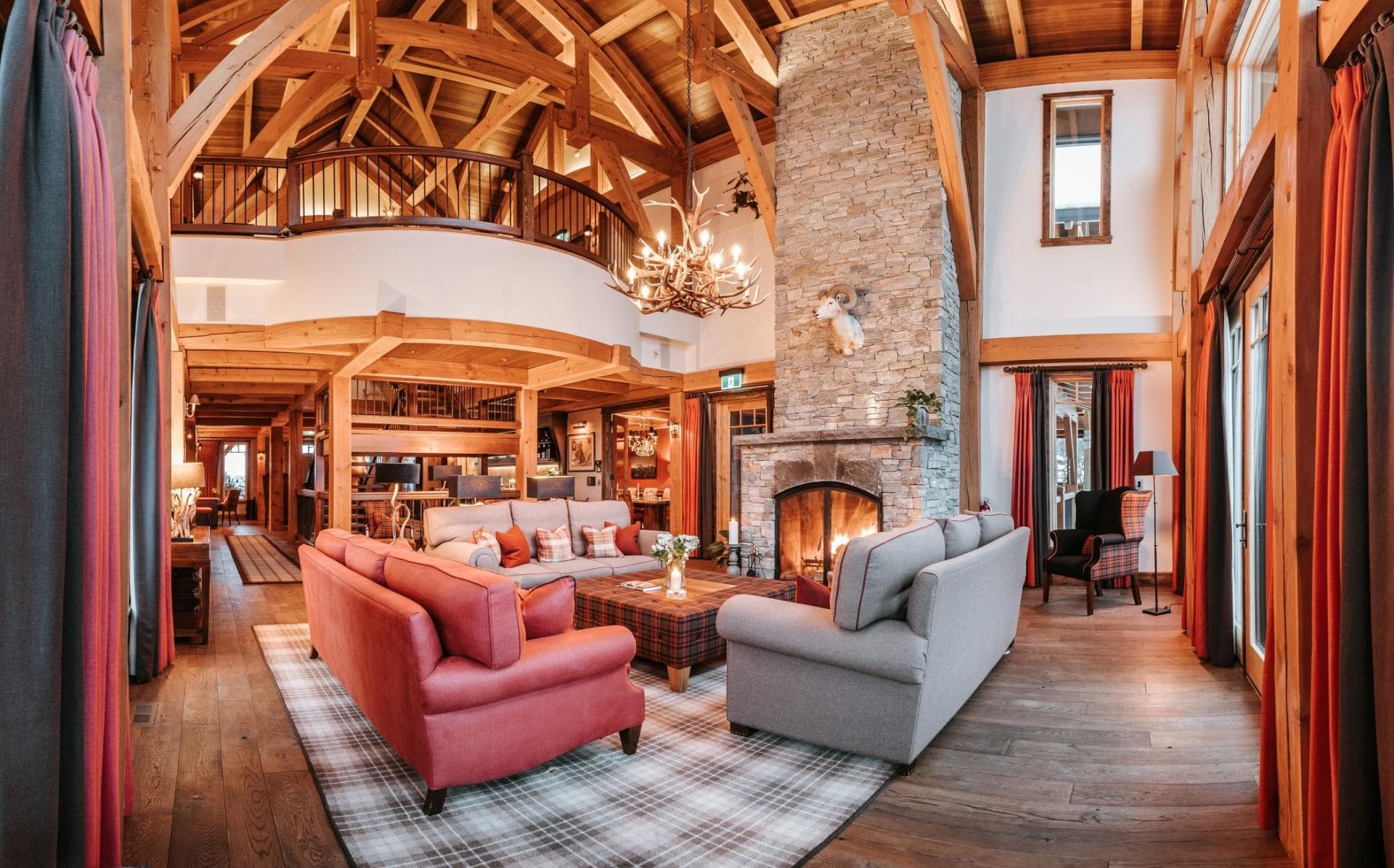Great room with wood-burning fireplace and mezzanine overlook