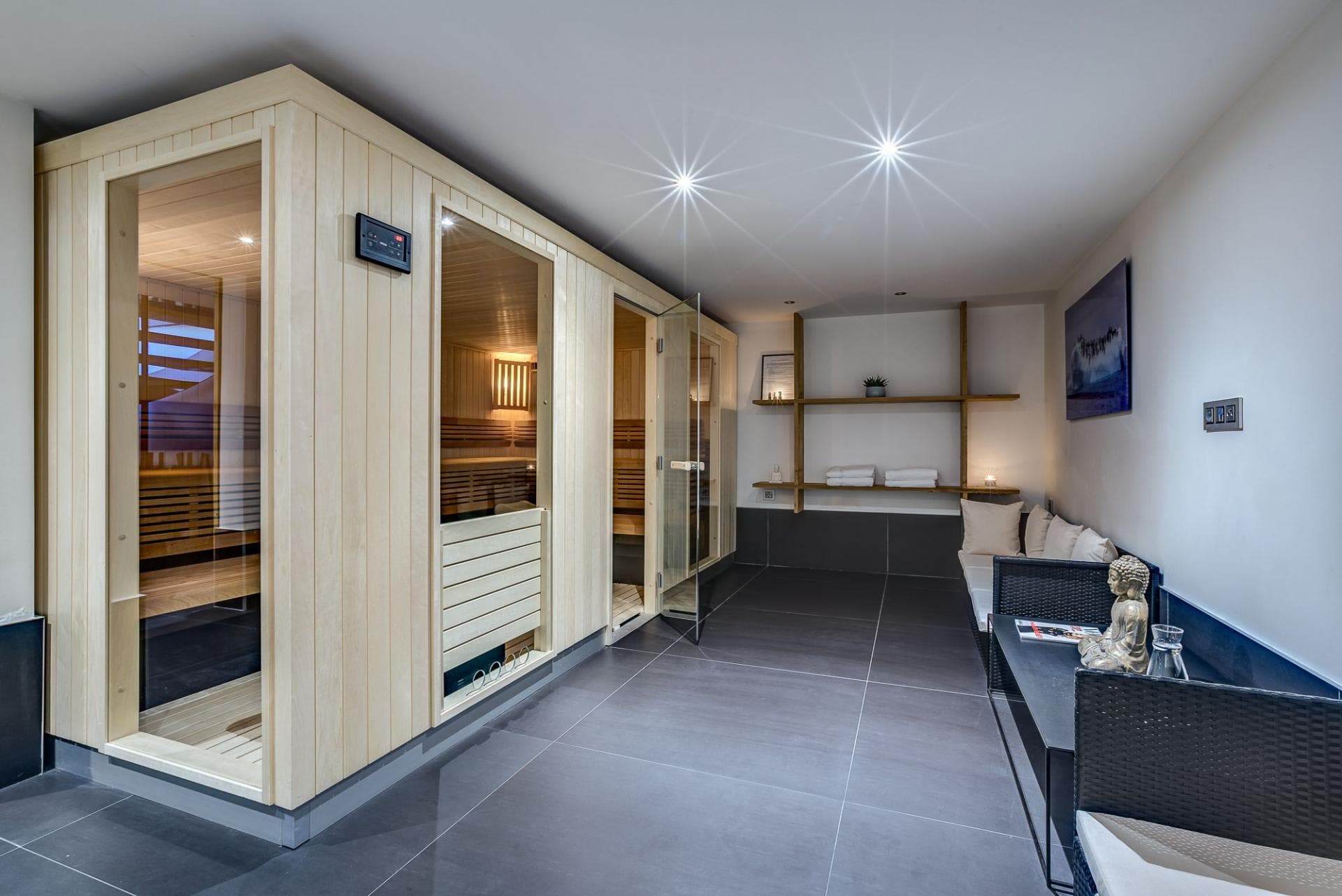Private indoor sauna with digital controls and relaxation lounge