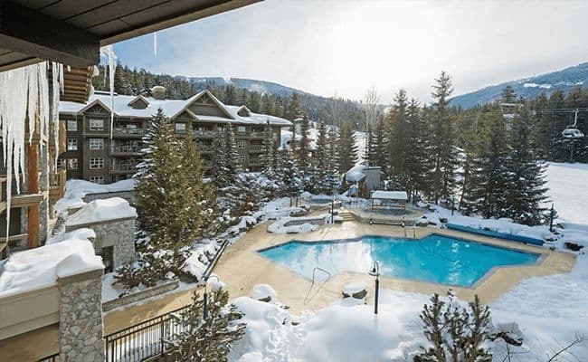 Heated outdoor pool and hot tub with ski-in/ski-out access