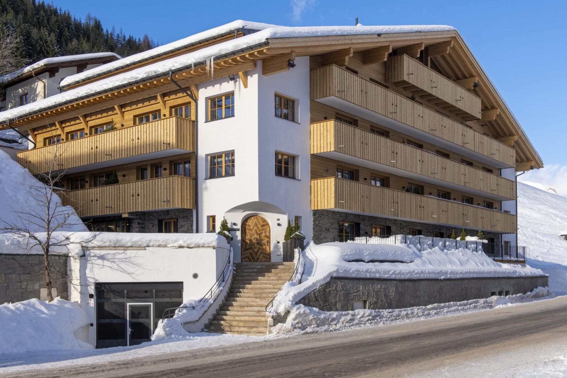 Chalet exterior with ski-in/ski-out access and private balconies
