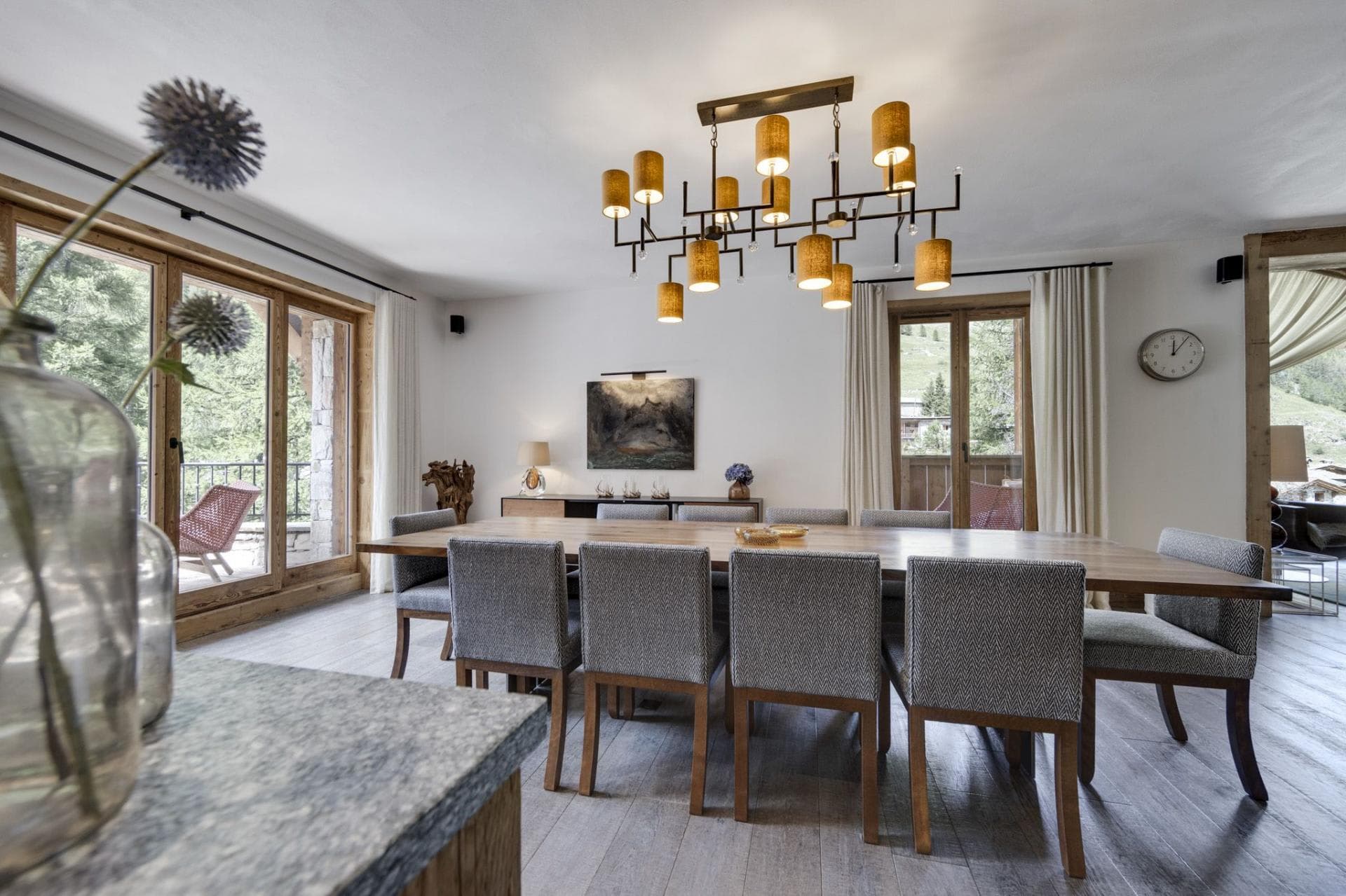 Dining area with seating for 10 and balcony access