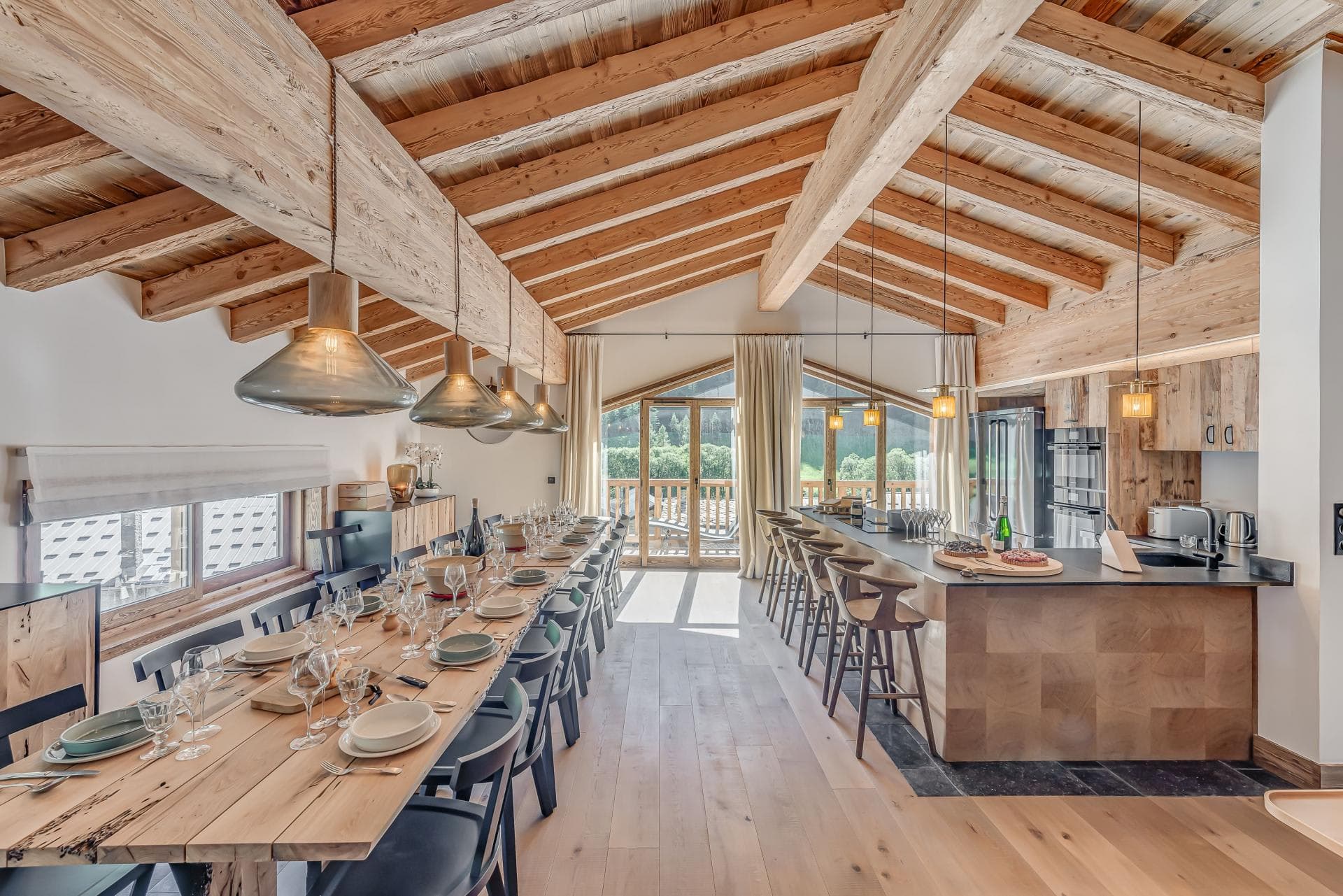 Open dining area and kitchen seating 18; vaulted timber ceilings