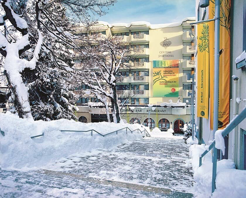 Hotel exterior with private balconies and on-site piano bar restaurant