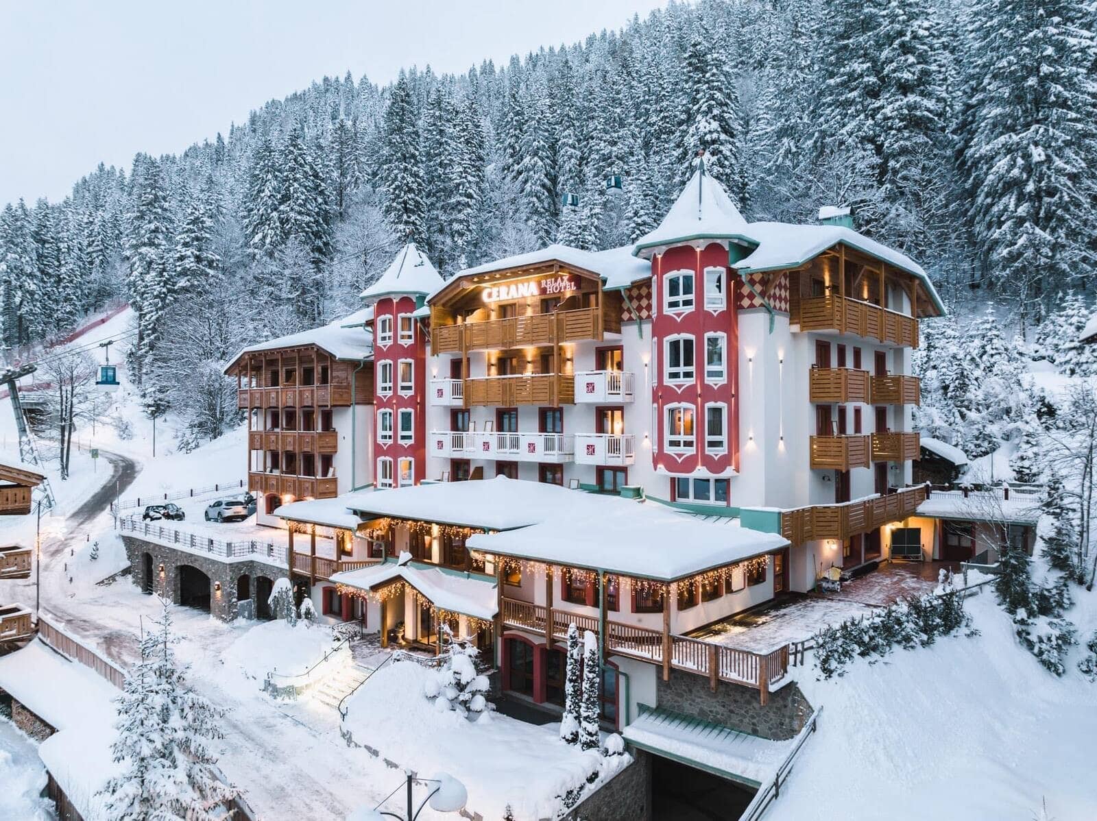 Hotel exterior with private balconies and direct ski lift access