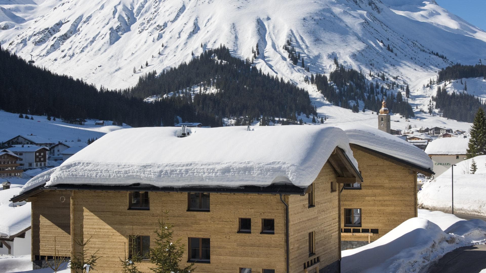 Chalet exterior with mountain views and proximity to village center