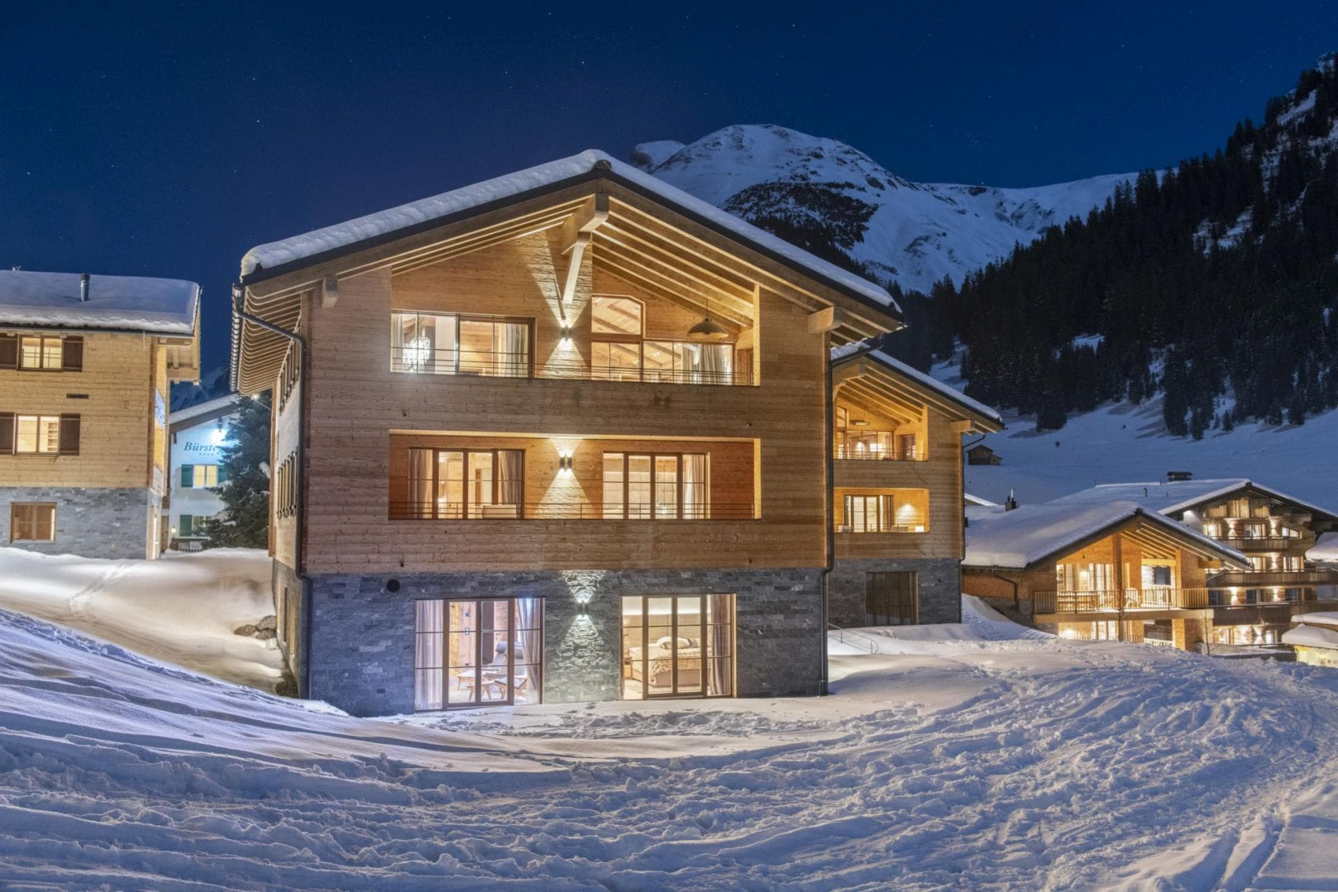 Three-story timber chalet with direct ski-in access and mountain views