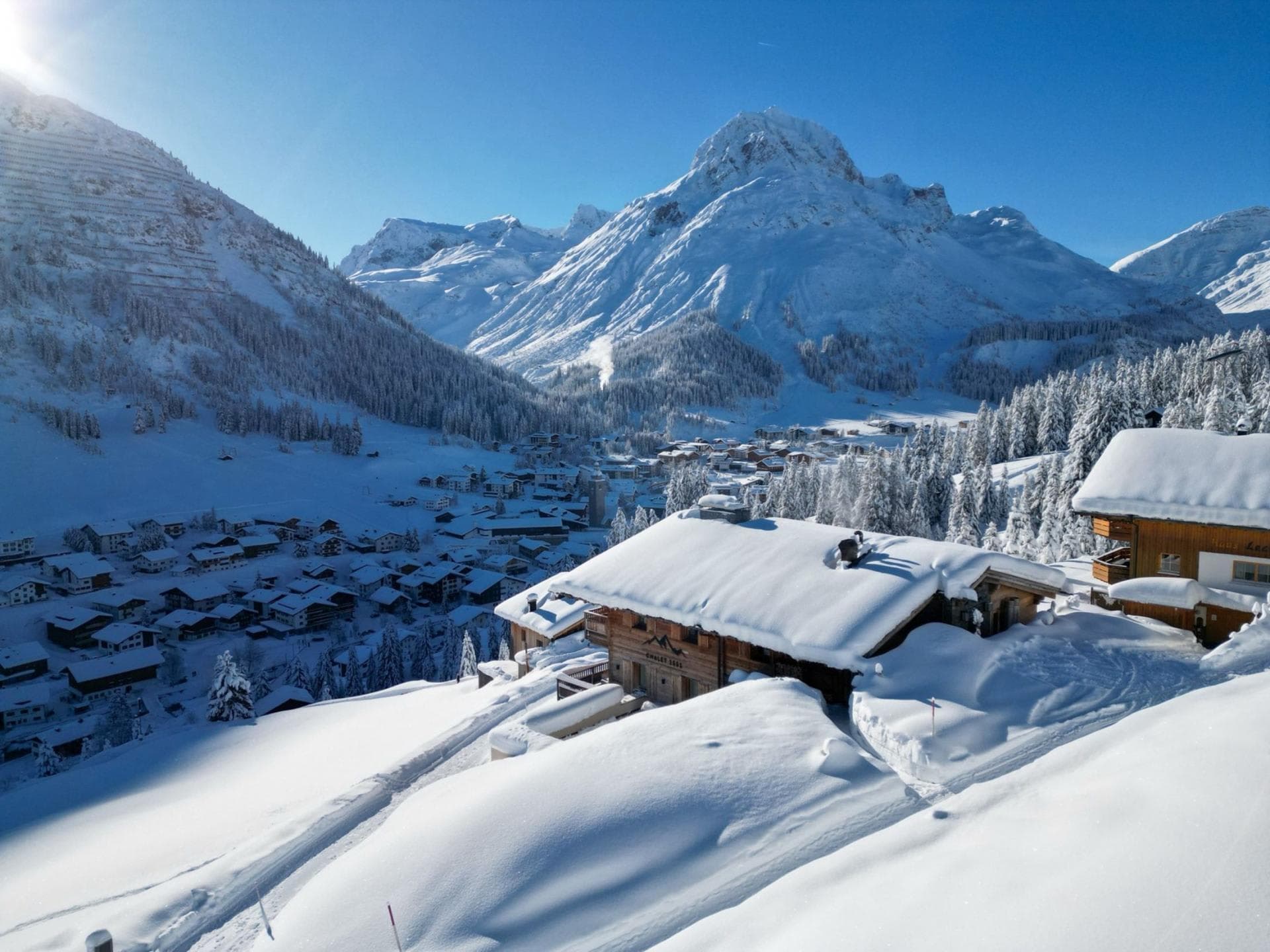 Chalet exterior with ski-in access and views over the alpine village