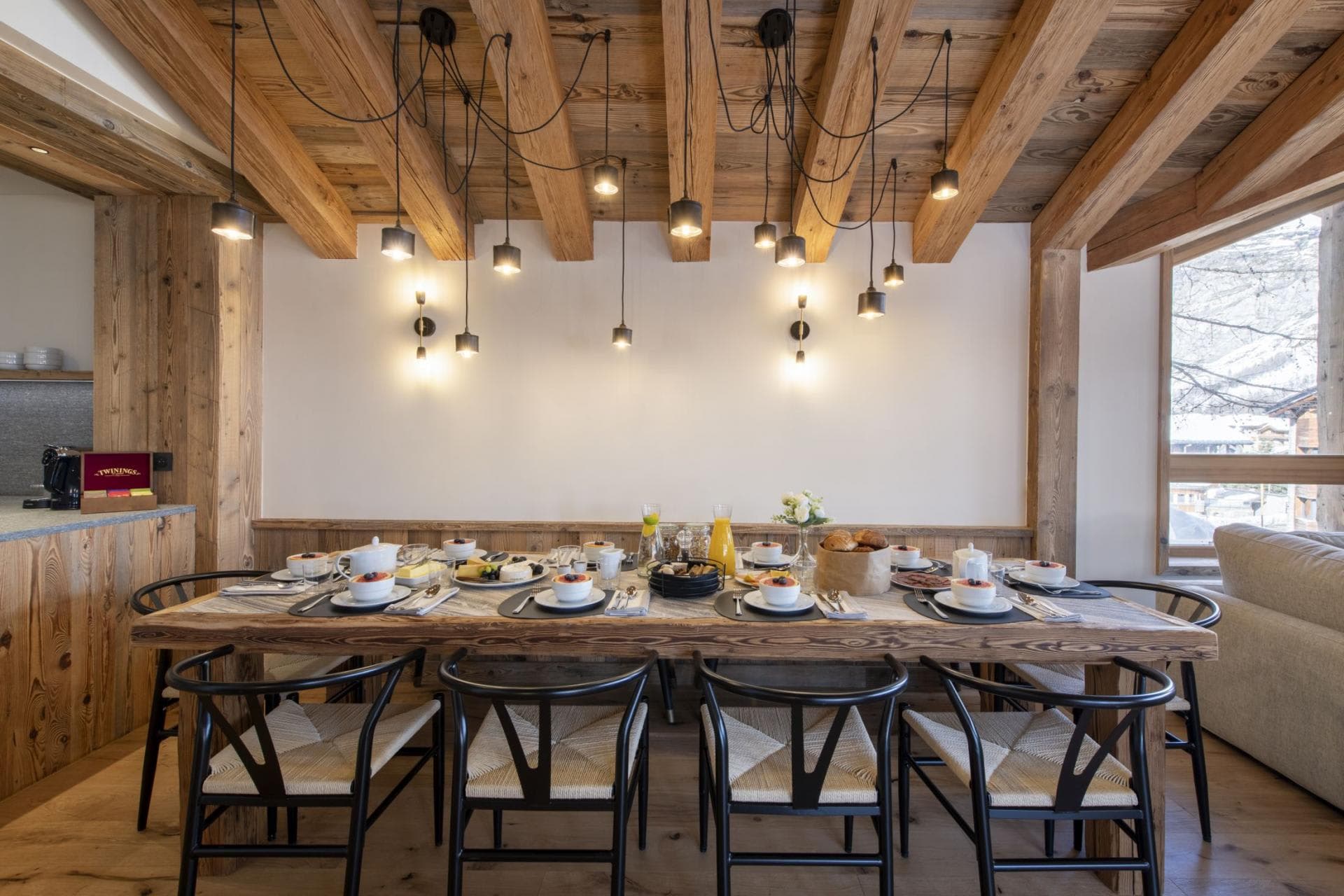 Dining area seats 10 with mountain views