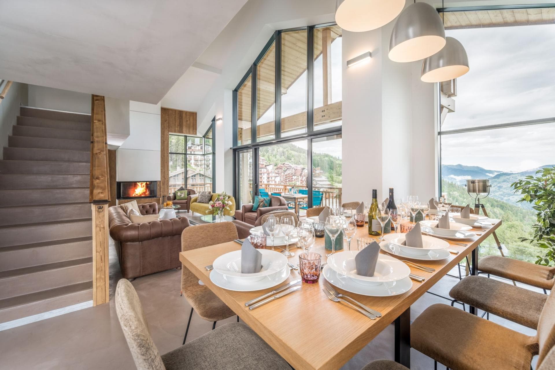 Open-plan dining area with seating for 10; mountain valley views