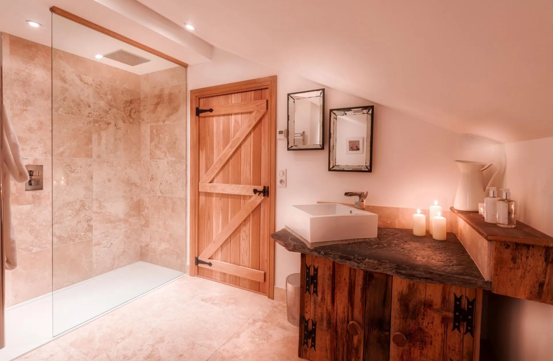 Bathroom featuring walk-in rainfall shower and live-edge stone vanity