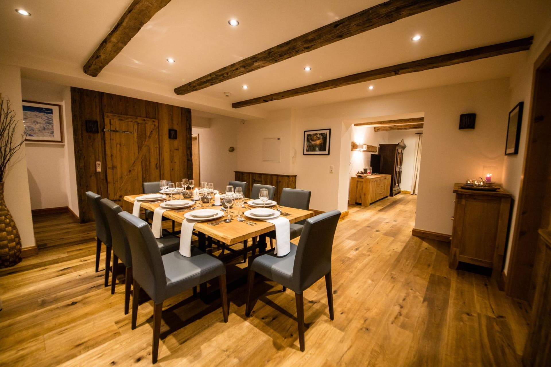 Dining area seats 8 with exposed timber beams and oak flooring
