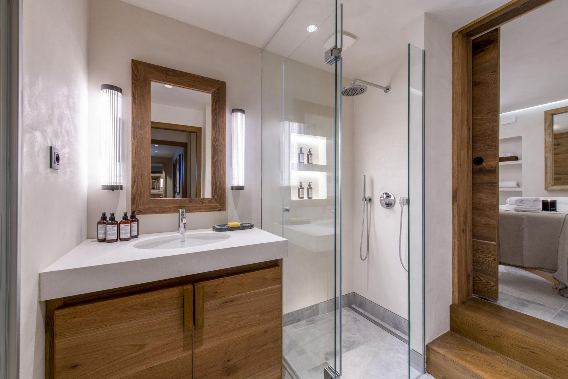 Ensuite bathroom with glass walk-in shower and rainfall showerhead
