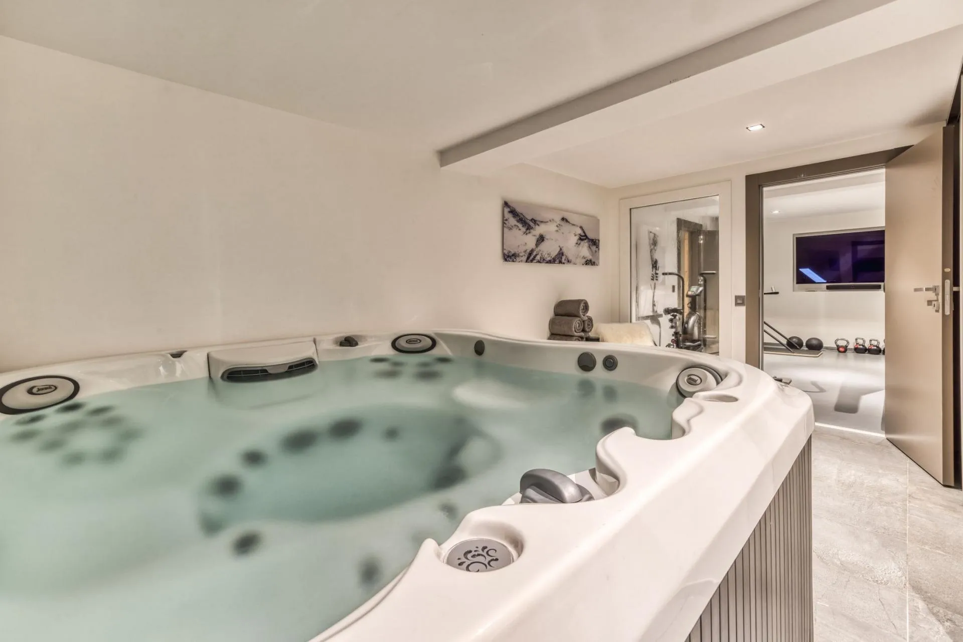 Indoor jacuzzi beside the fitness room