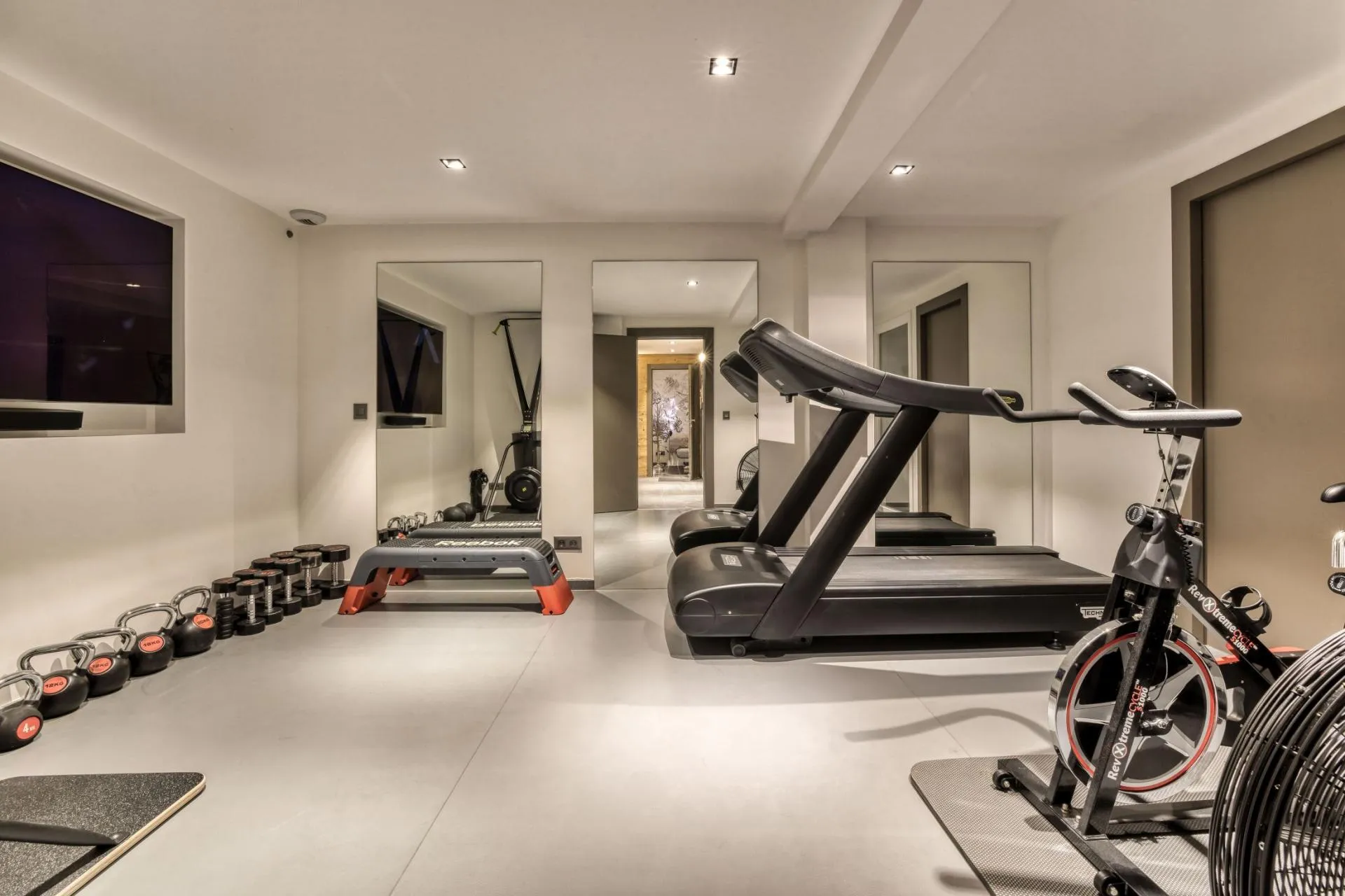 Fitness room with exercise equipment