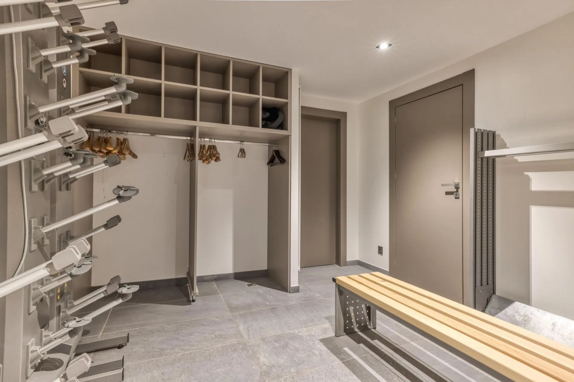 Ski room with boot heaters and bench seating