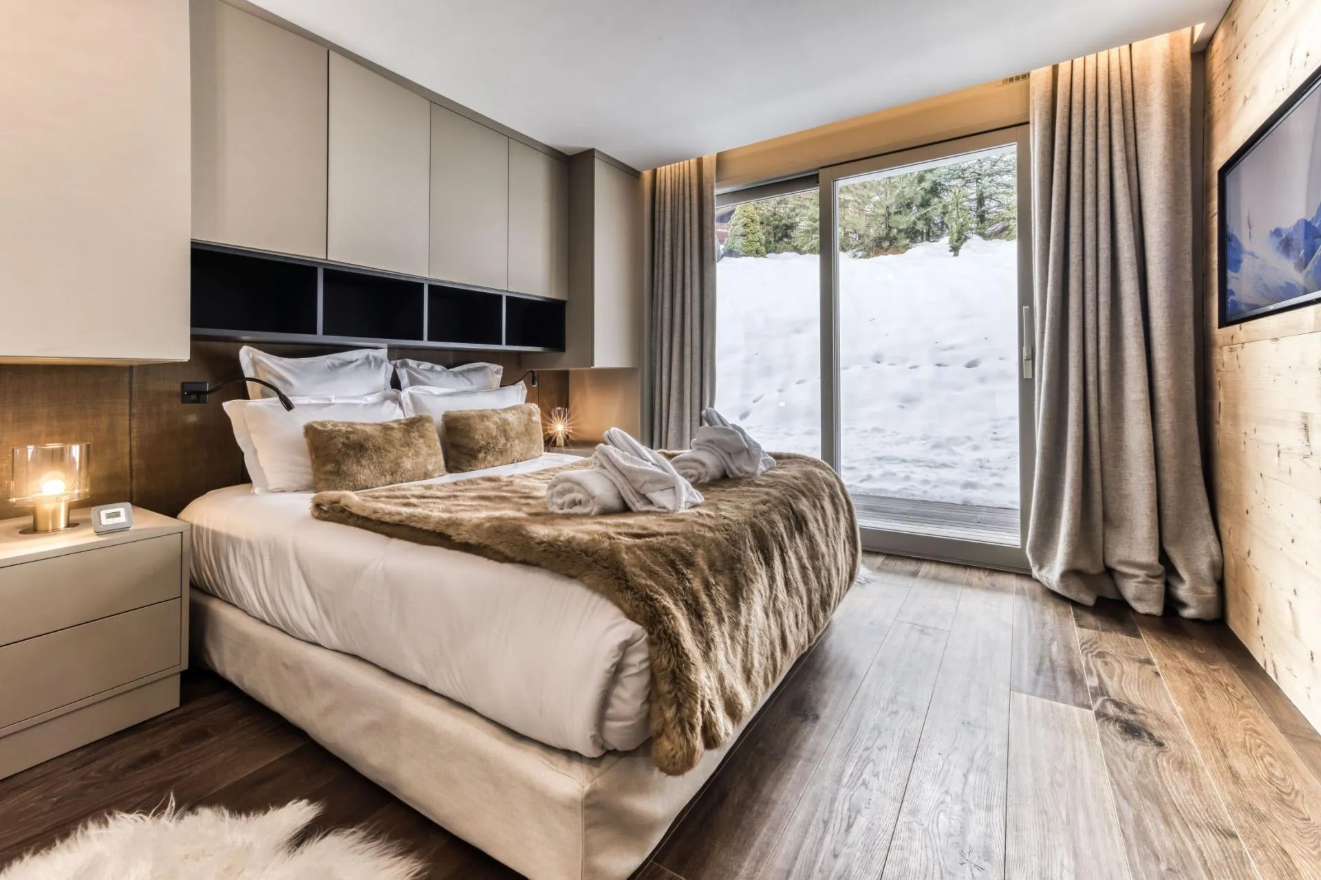 Double bedroom beside sliding glazed doors