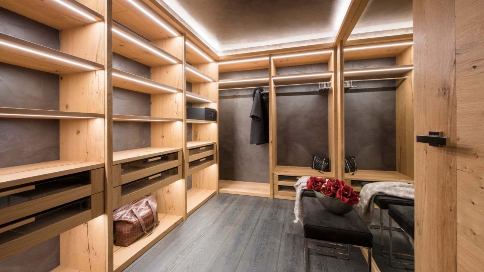 Walk-in closet with integrated LED lighting and secure safe