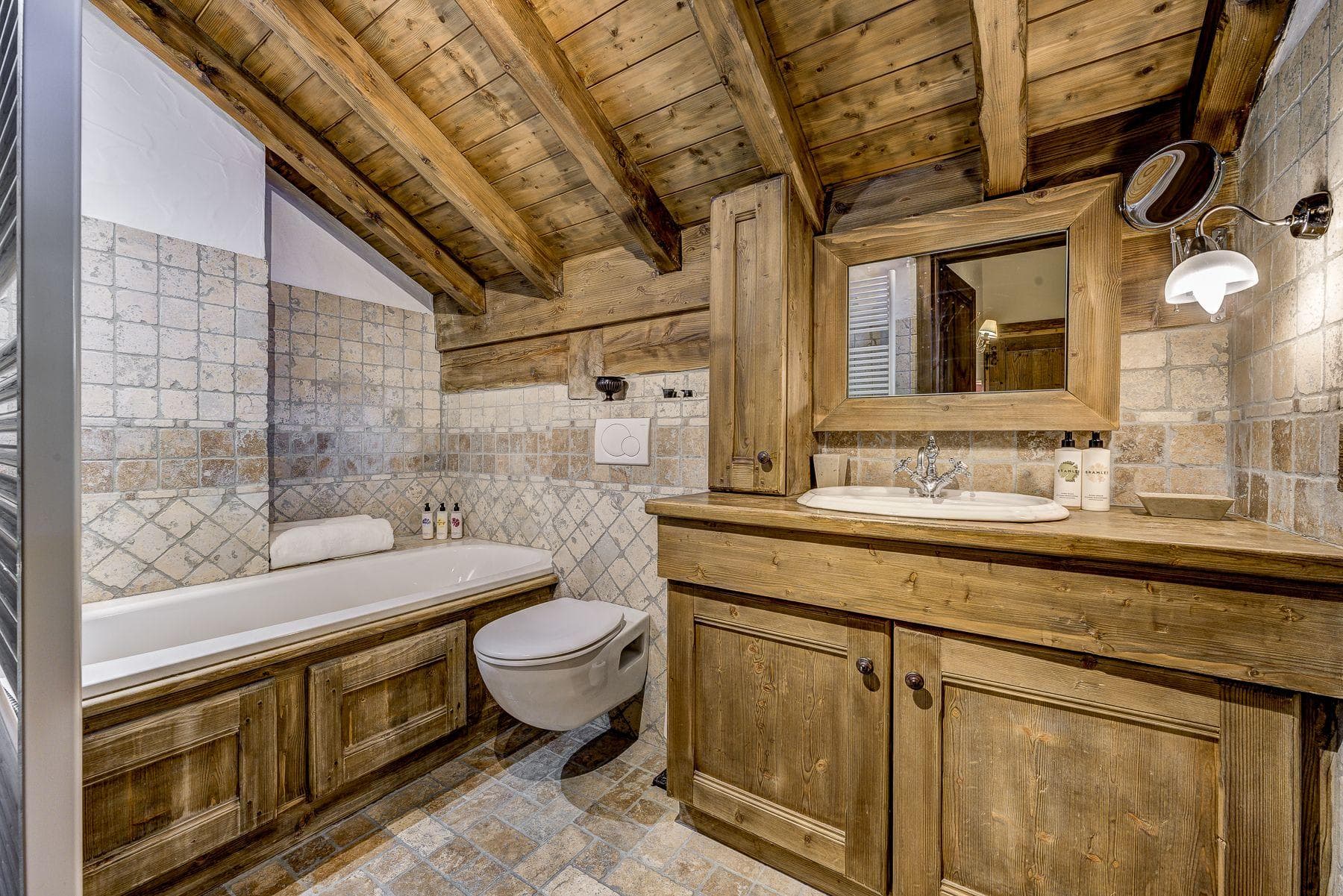 Bathroom with soaking tub and heated towel rail