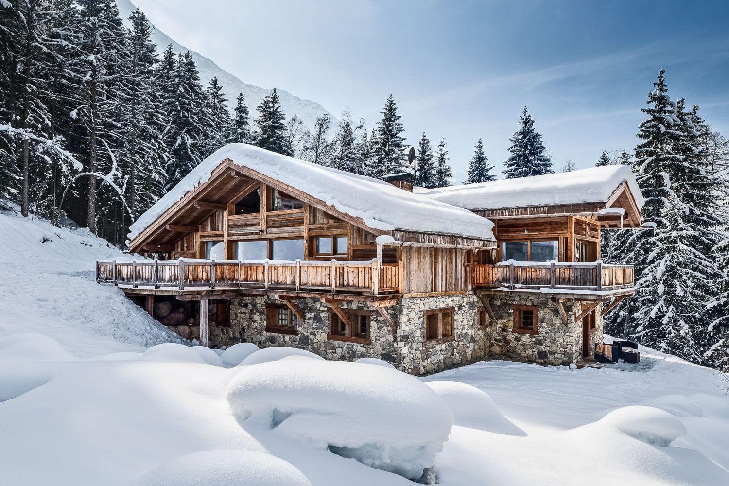 Ski-in, ski-out timber chalet with wrap-around sun deck