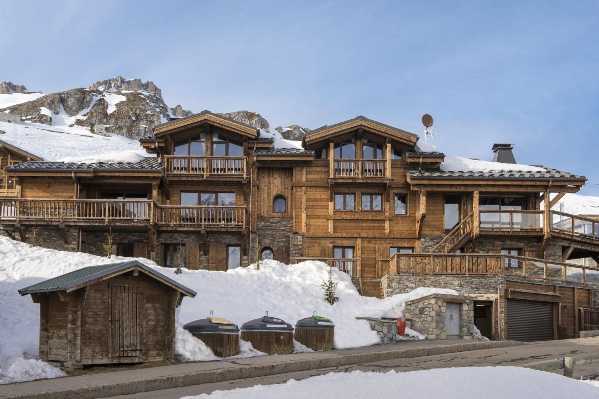 Ski-in chalet with mountain views, private balconies, and street-level garage