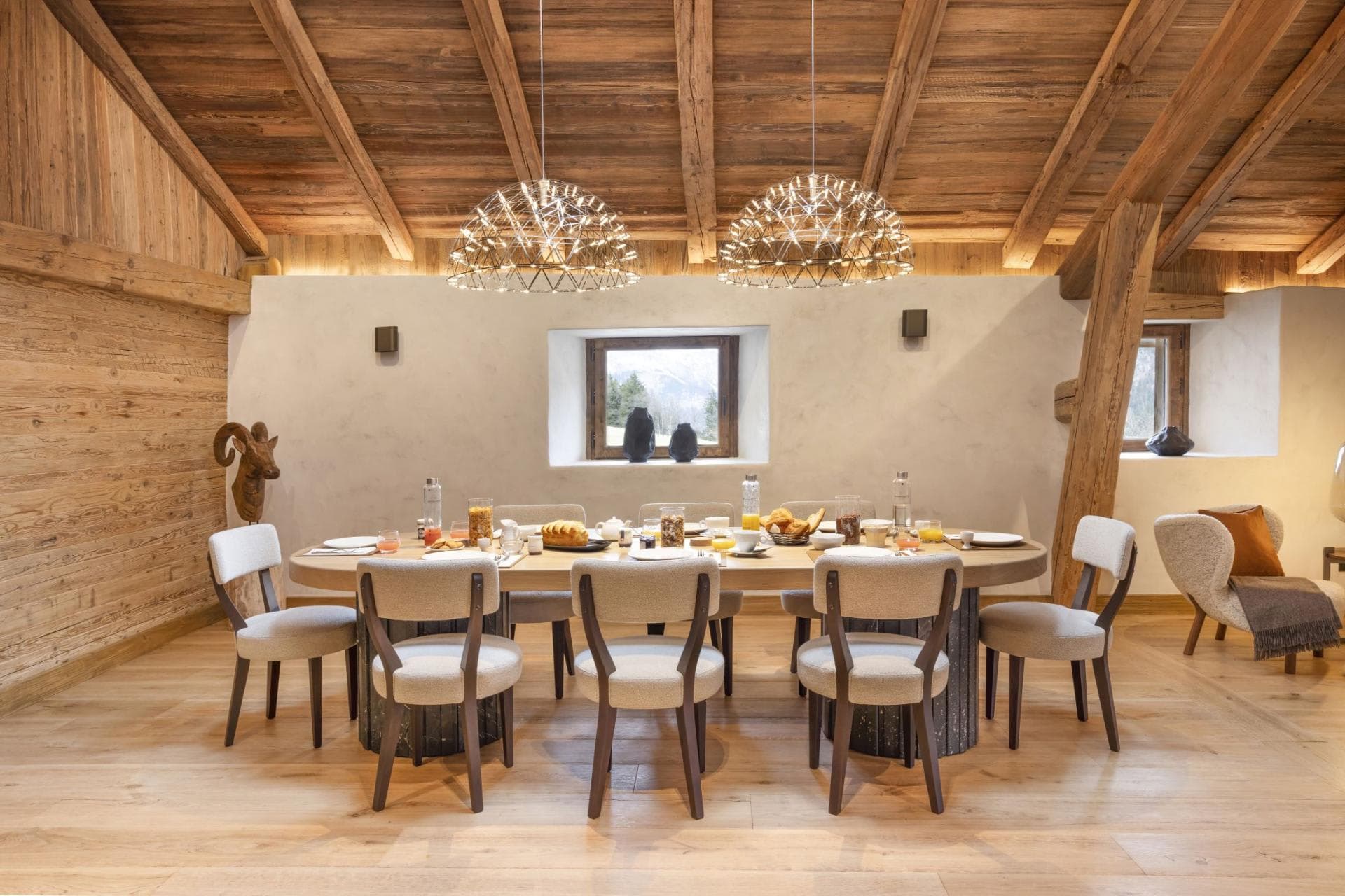 Dining area with seating for 8; vaulted timber ceilings