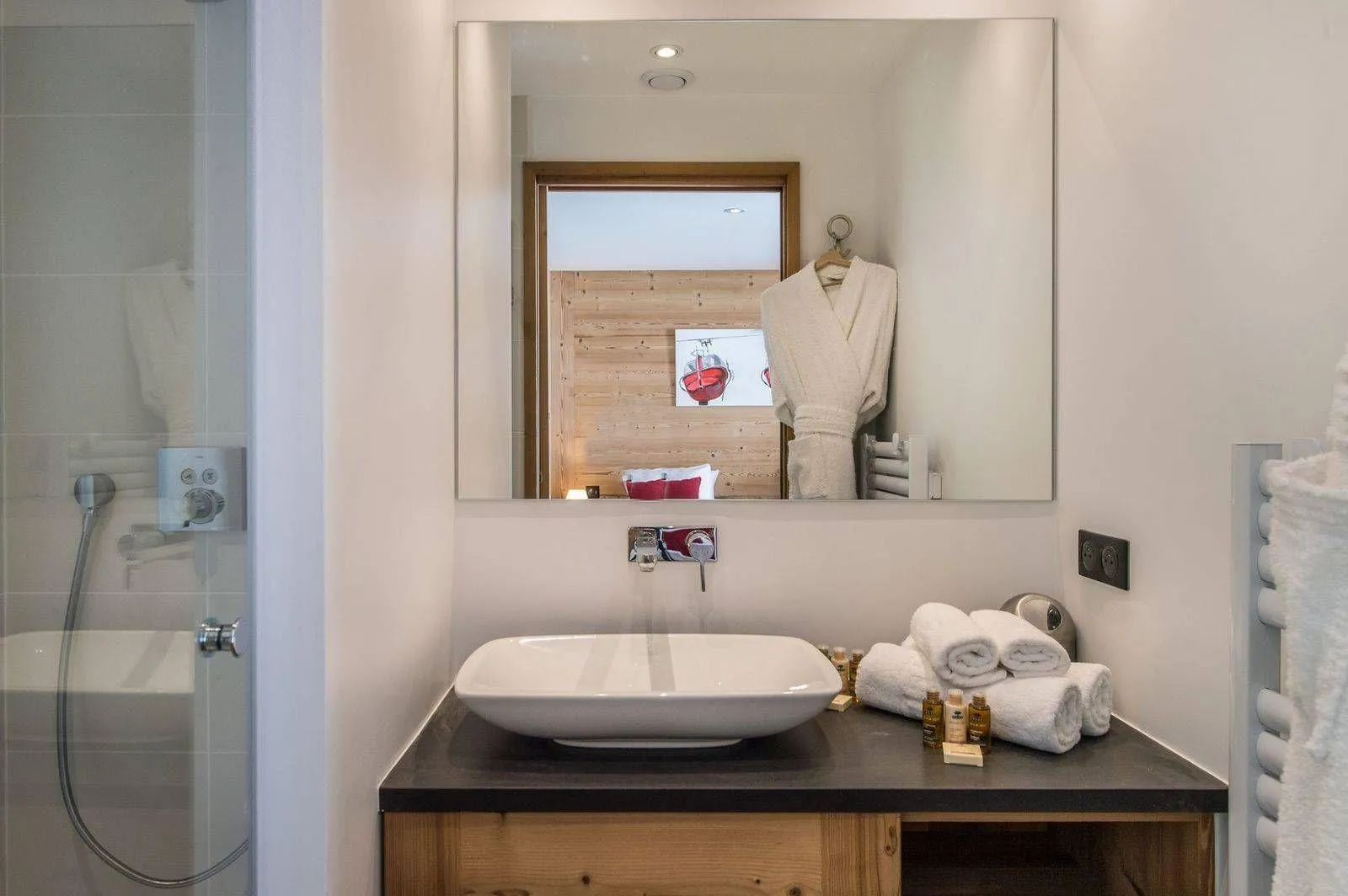 Shower room with basin and heated towel rail