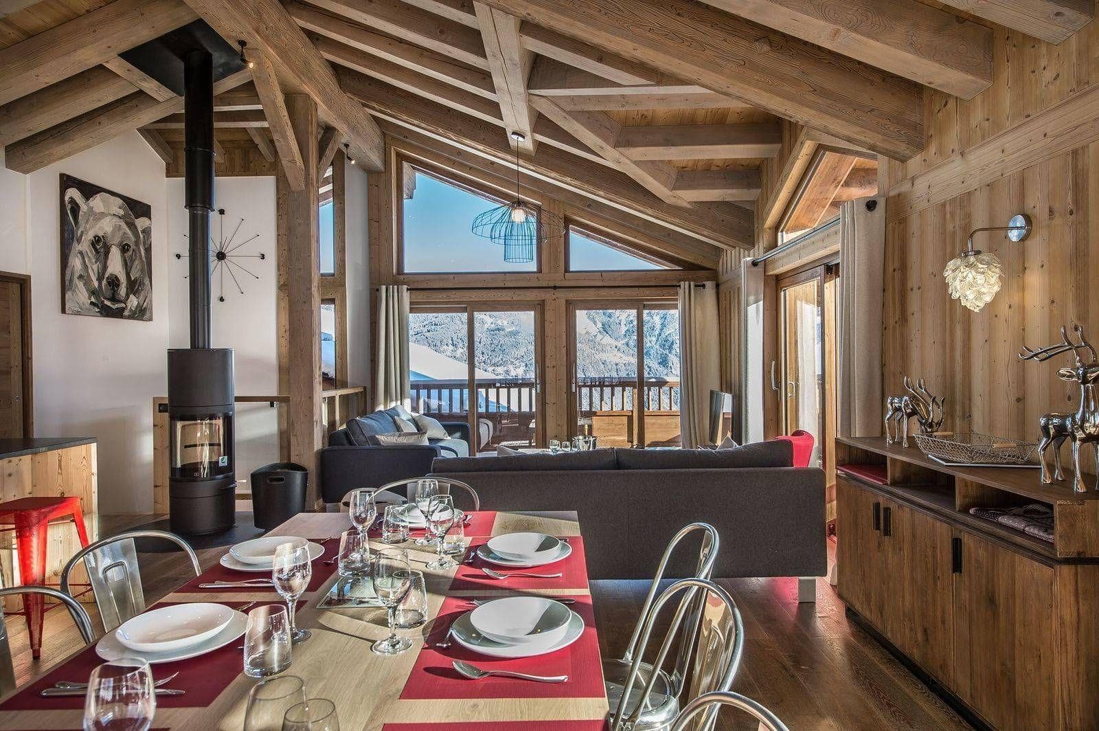 Open-plan dining and living area with a wood stove