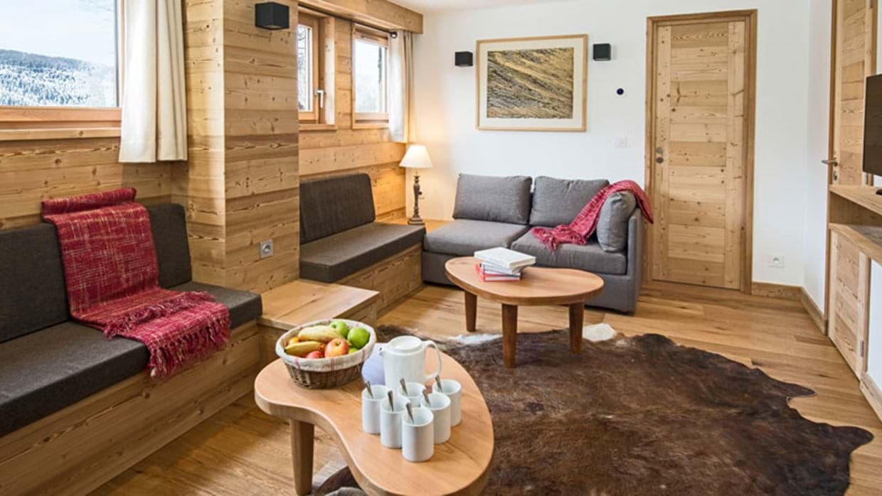 Media room with built-in bench seating and wall-mounted television