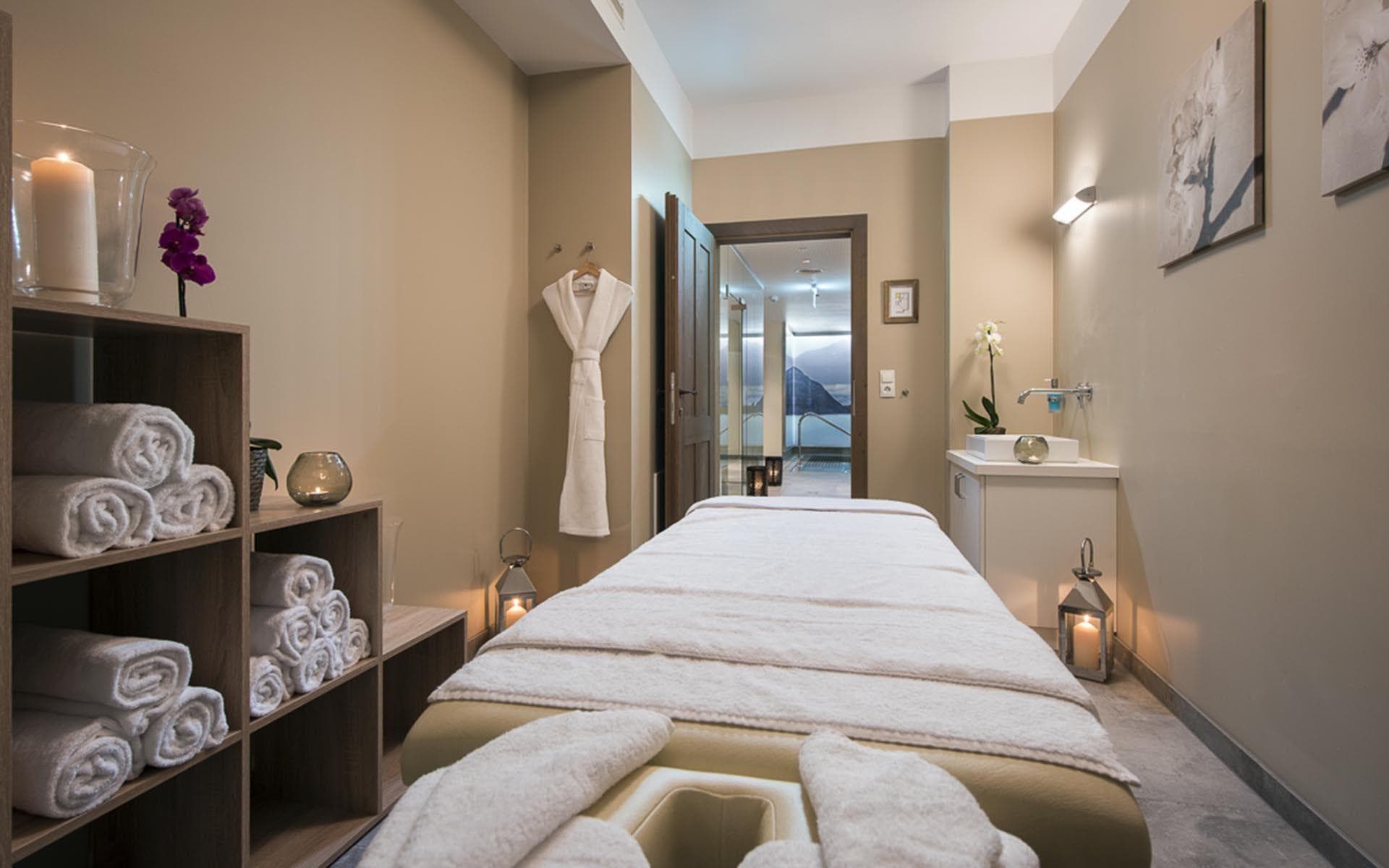 Massage room with sink and direct access to indoor pool