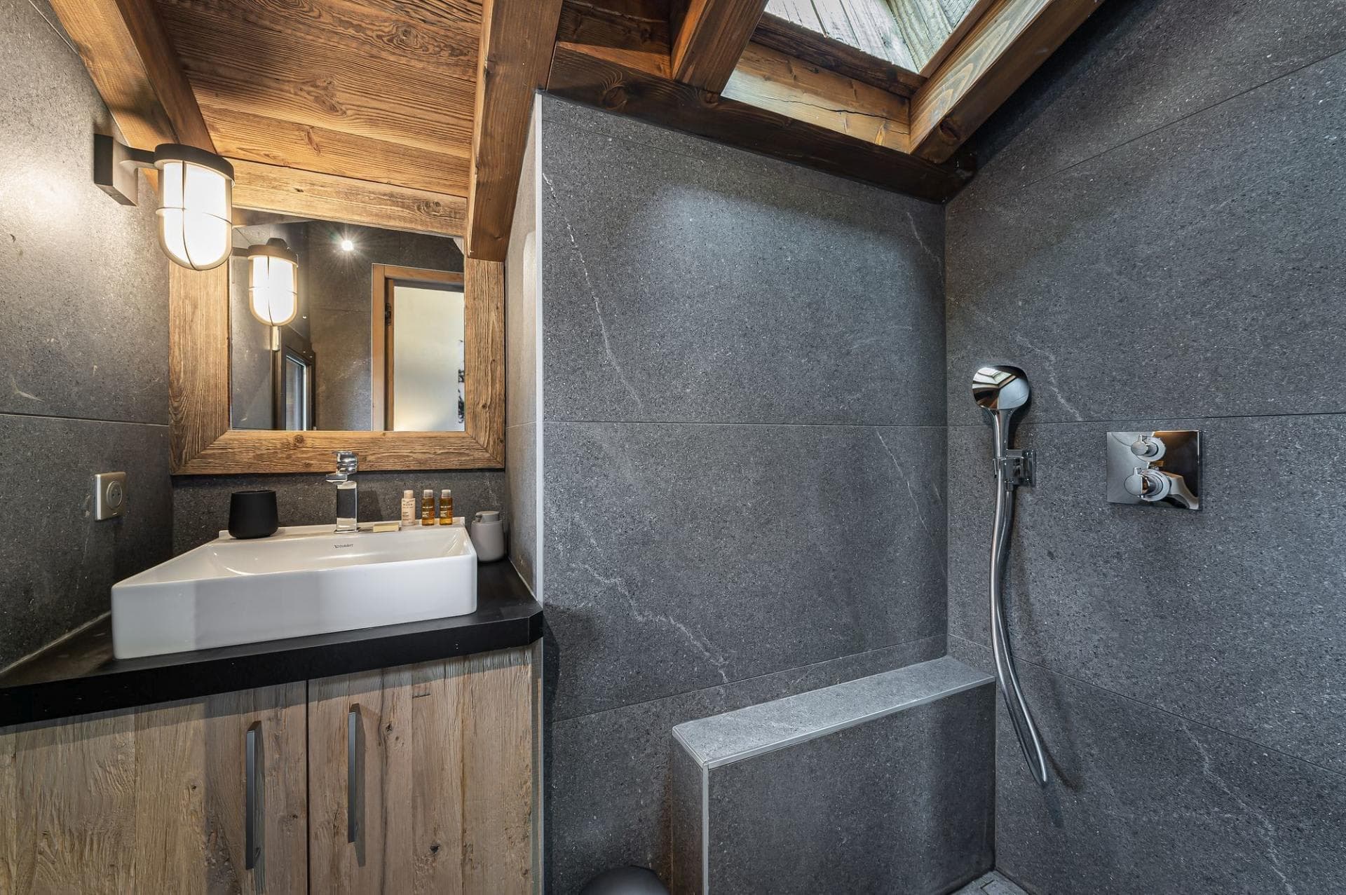 En-suite walk-in shower room beneath a skylight