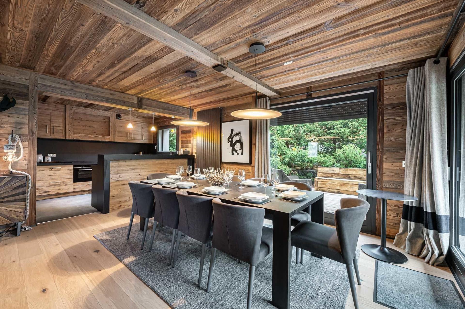 Dining table seats 8; sliding doors lead to outdoor terrace