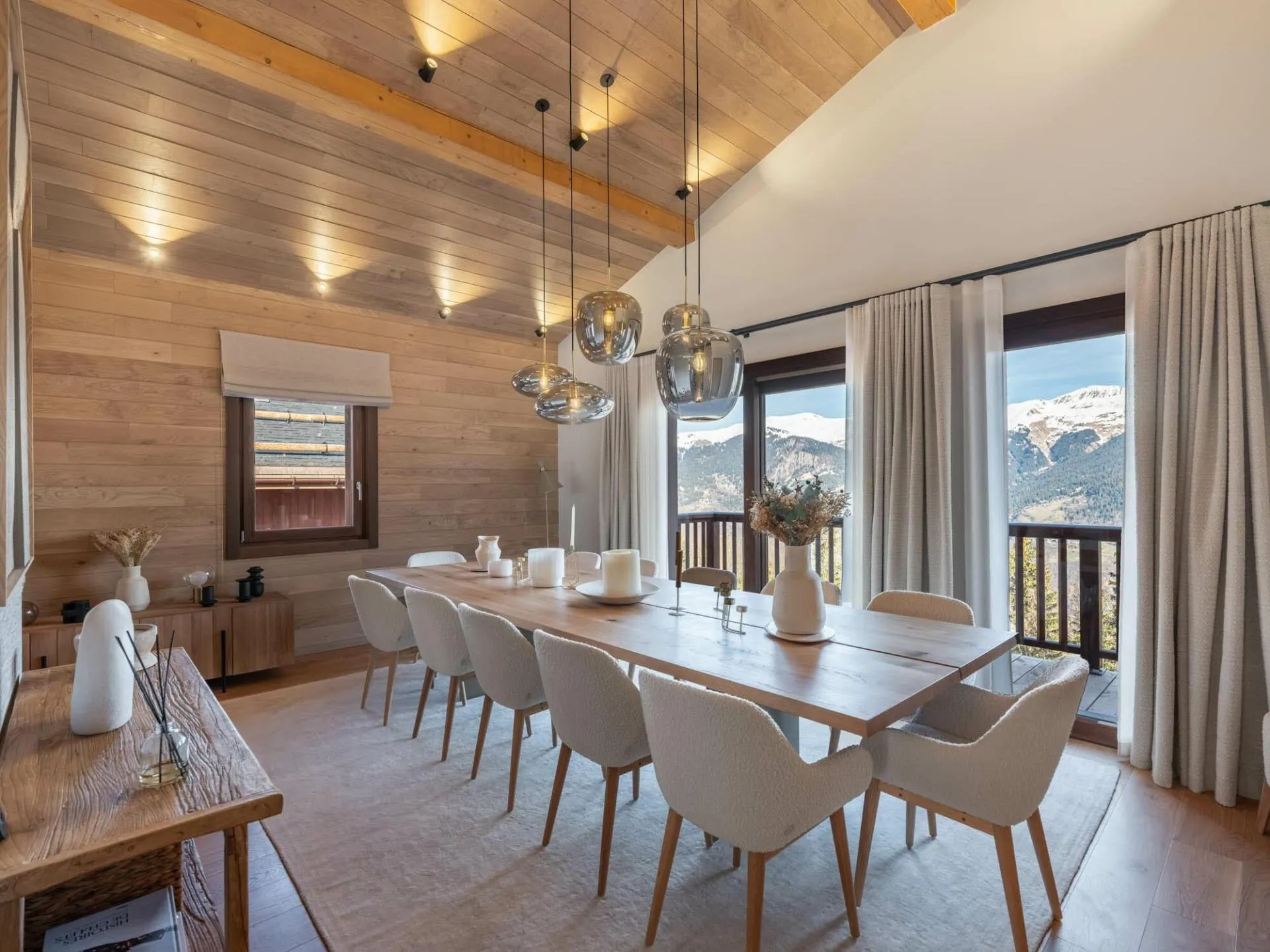 Dining area beside glazed balcony doors